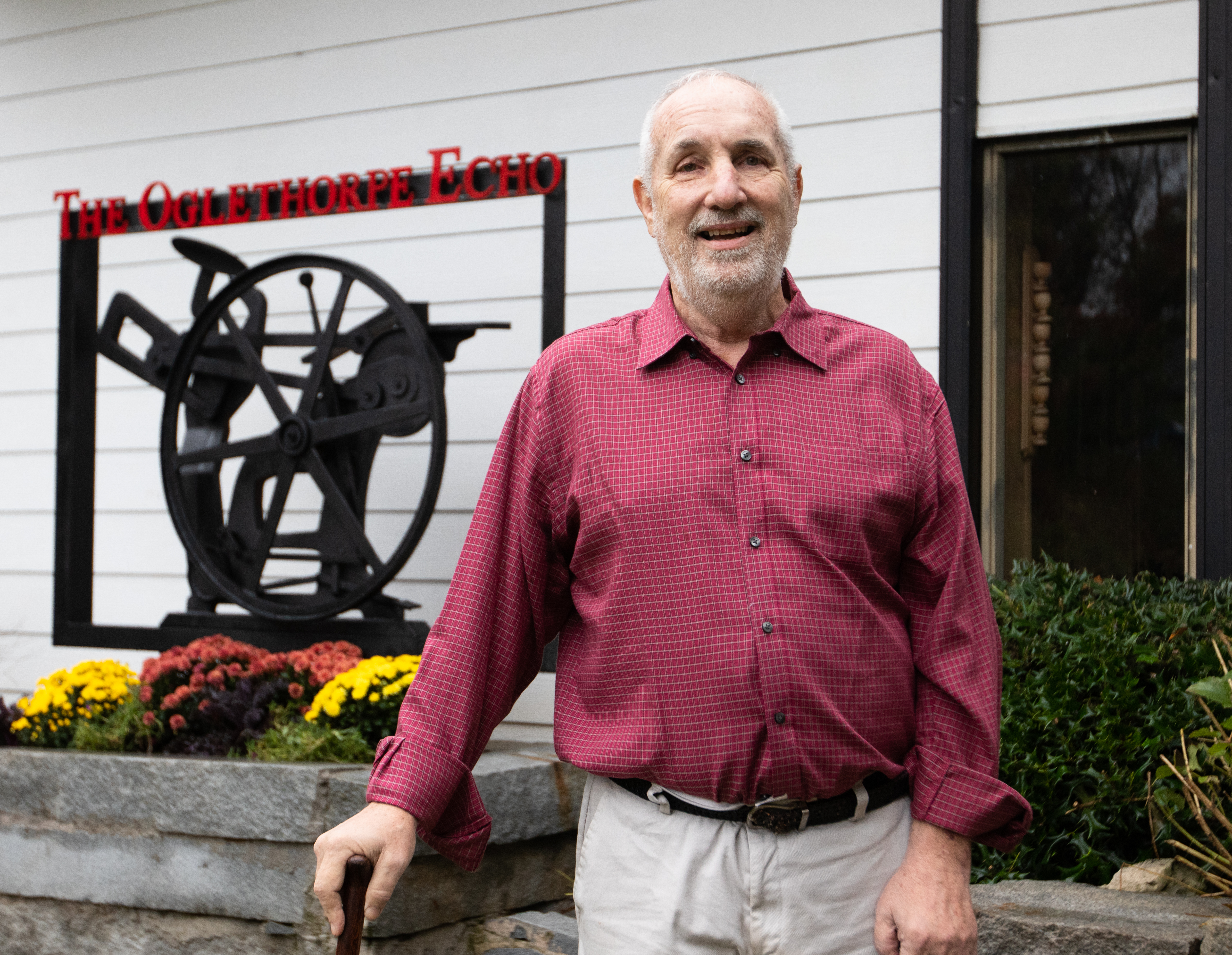 Ralph Maxwell, former owner and editor of The Oglethorpe Echo, poses for a portrait outside of The Oglethorpe Echo building on Oct. 29, 2021. Maxwell had been the owner, publisher and editor of the Echo since 1981. (Photo/Sarah White)