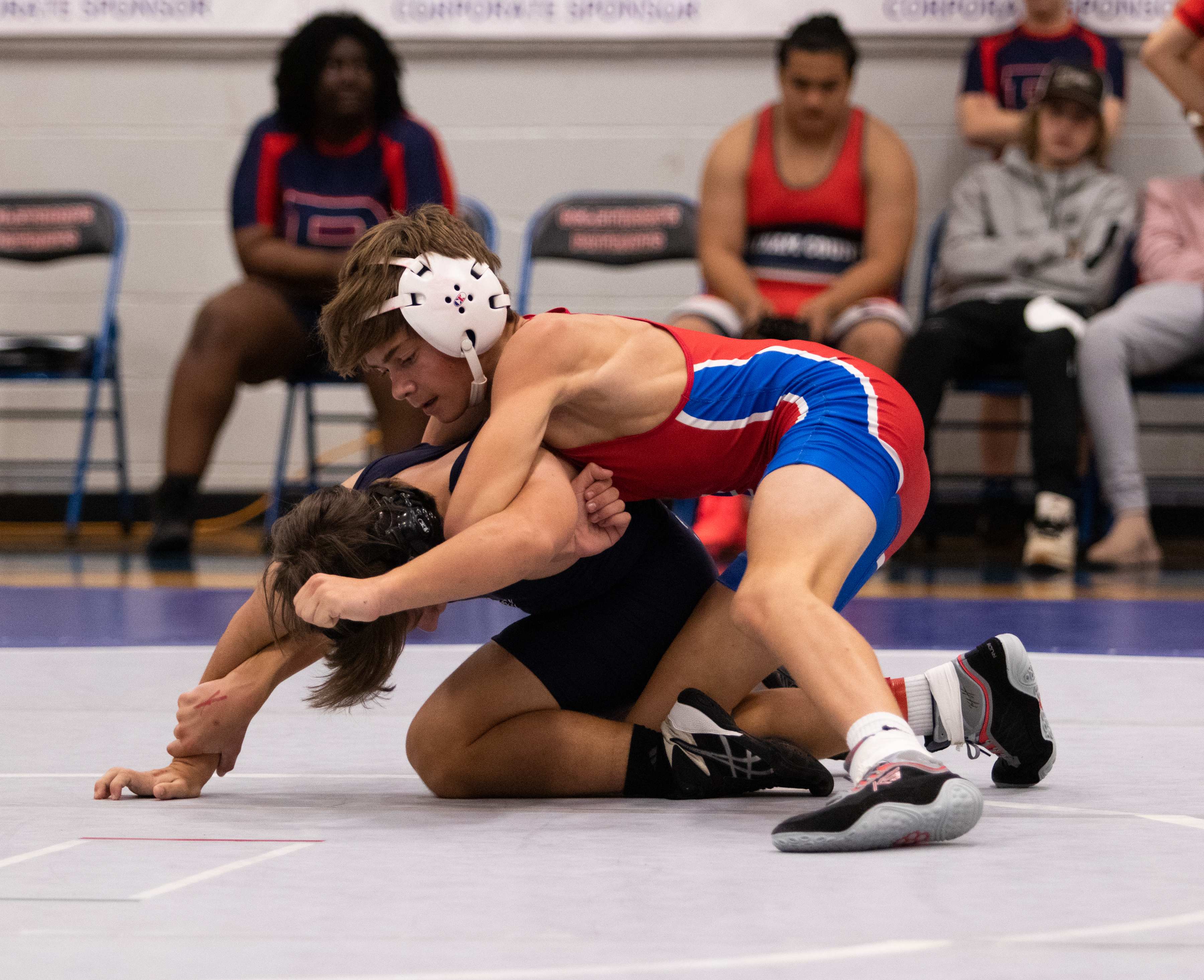 Freshman Miles Mason wrestles AJ Harris of Putnam County in Oglethorpe County's home opener. The Patriots defeated Putnam County 72-18. (Photo/Sarah White)