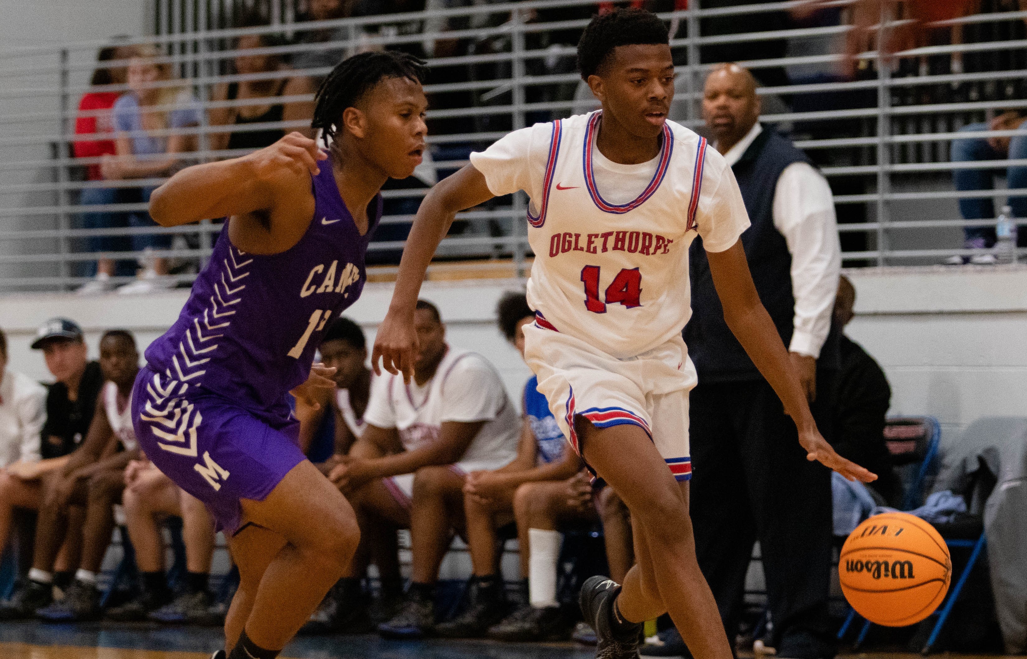Javaun Pittard drives down the court in Oglethorpe County’s 58-54 victory over Monticello on Dec. 3. He scored 13 points in that win and has become one of the Patriots’ top scorers this season.  (Photo/Sarah White)