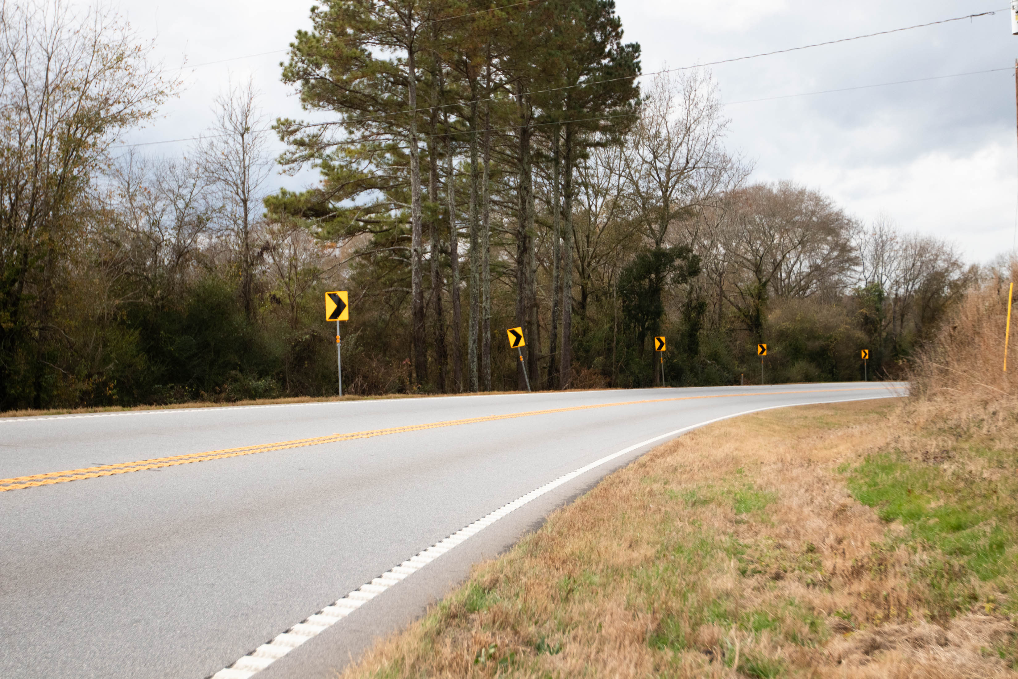 Cherokee Corner is marked by signs showing the direction of the curve. (Photo/Sarah White)