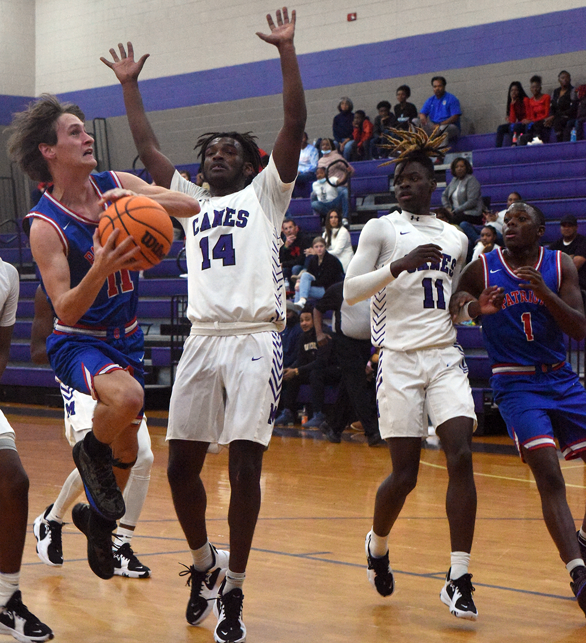 Luke McGarity drives to the basket in a 39-36 loss to Jasper County. (Photo/Sarah White)