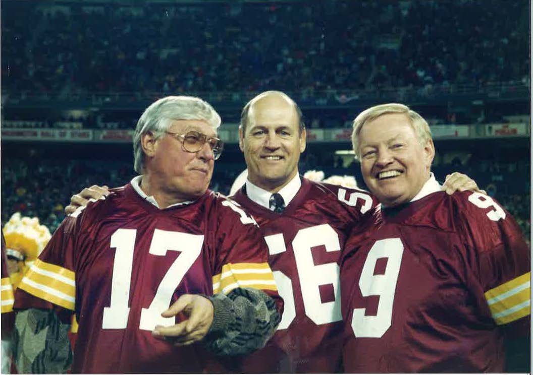 Len Hauss, center, enjoyed a reunion with his former quarterbacks Billy Kilmer, left, and Sonny Jurgensen at the last Redskins' game at Washington's RFK Stadium in 1996. Both quarterbacks attended Monday's memorial service for Hauss. Kilmer delivered a eulogy regaling their years in the NFL and fishing with Hauss on the Altamaha River. (Submitted Photo)