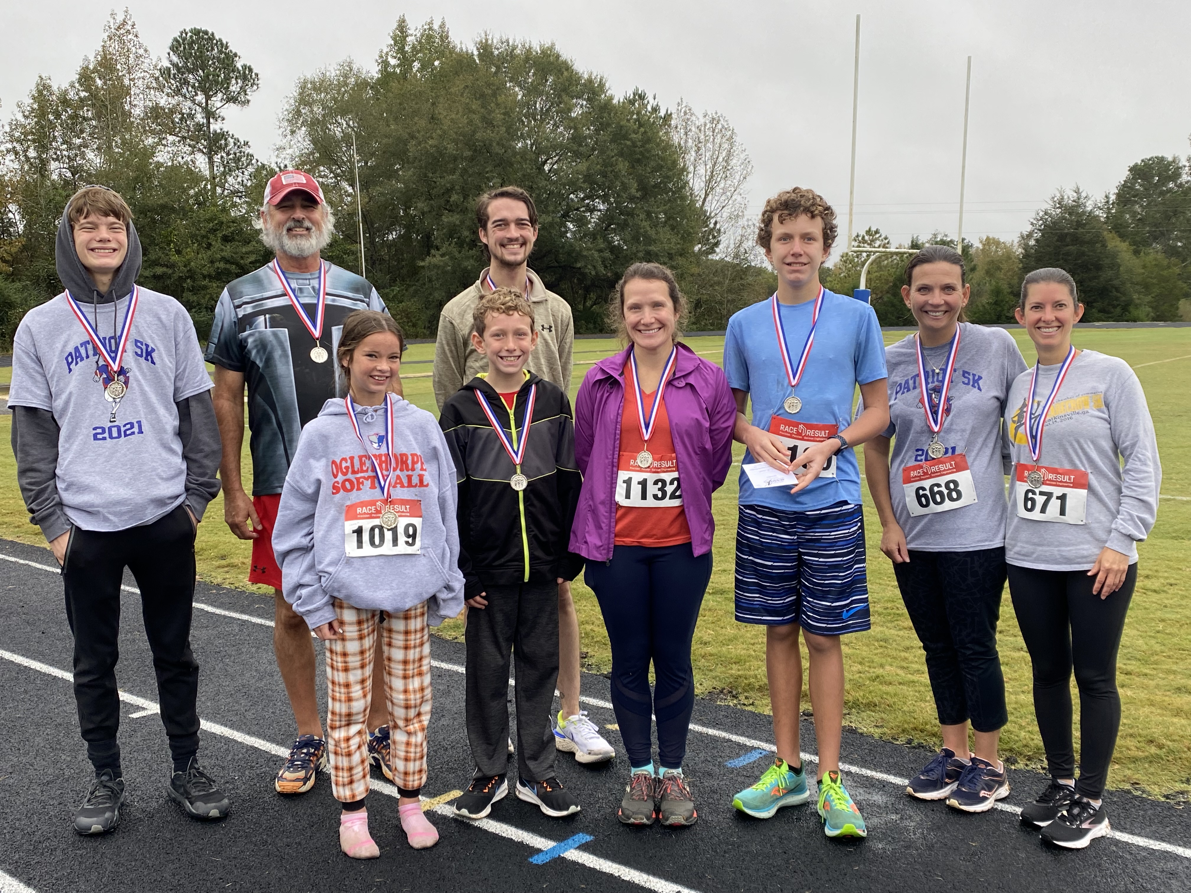 Tanner Mask (back row, from left), Randy Booth, Noah Huff-Merck, (front row, from left) Lannah Scarborough, Micah Dixon, Jennifer Dixon, Noah Dixon, Caroline Paradise Jenny Wisham, were the winners of the Patriot 5k. (Submitted Photo)