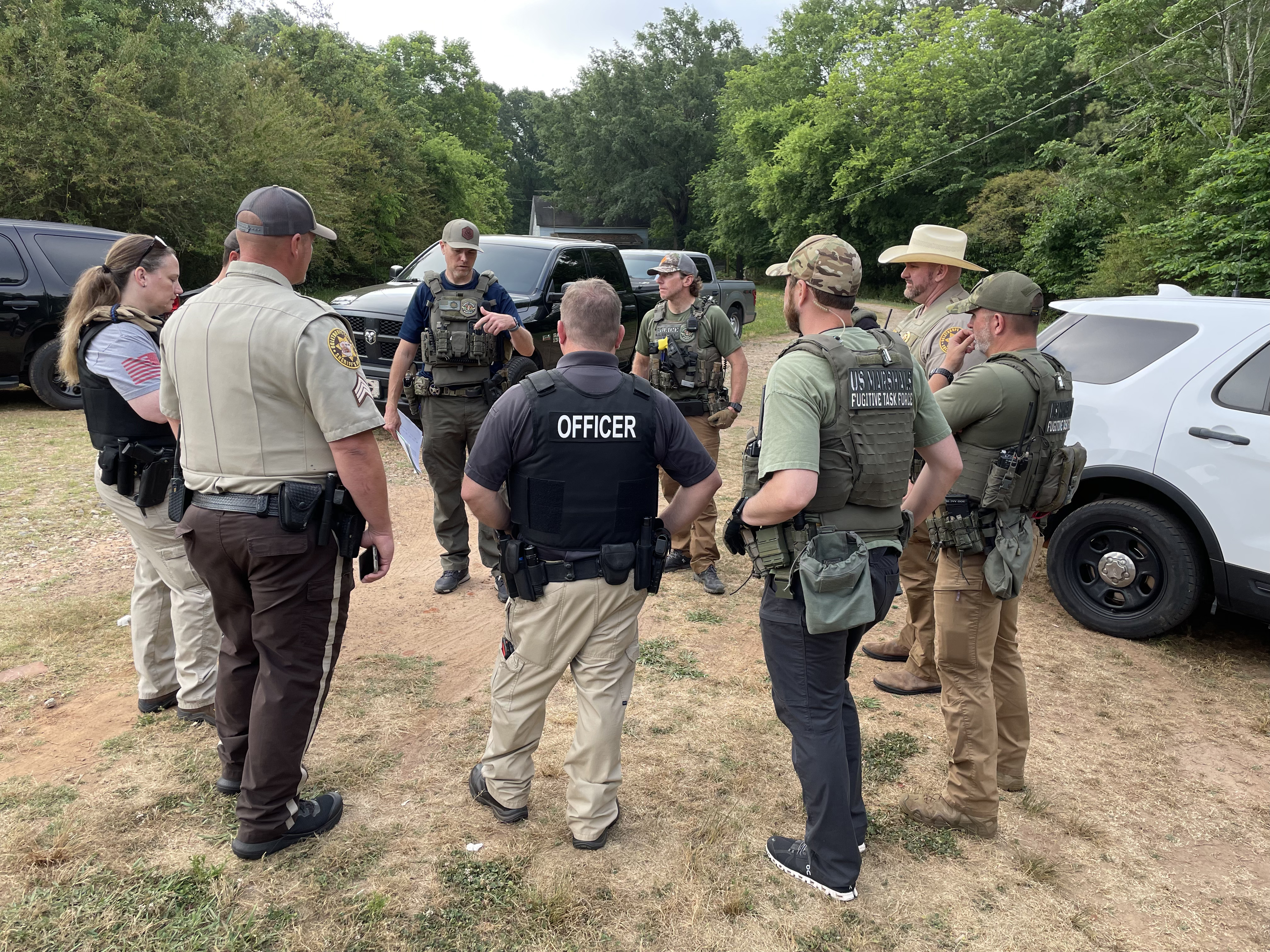 Law enforcement officers with various agencies, including the Oglethorpe County Sheriff’s Office, get together during Operation Washout Classic City, which resulted in 49 arrests in several counties. (Submitted Photo)
