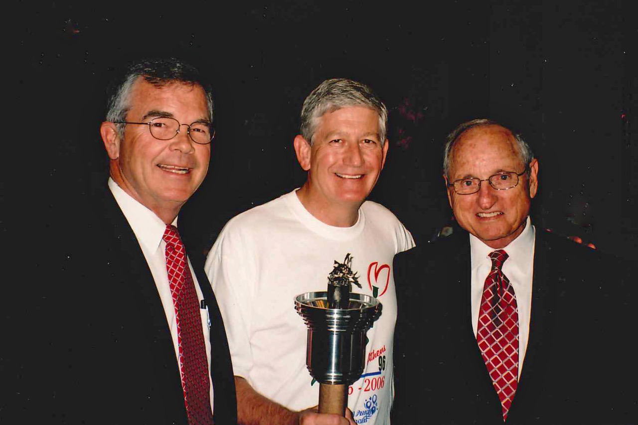 To celebrate the 10th anniversary of the 1996 Olympics, Athens and the University of Georgia re-enacted the torch run. As chairman of Athens 96, I invited Billy Payne, left, and Vince Dooley, right, to speak at the ceremony. (Submitted Photo)