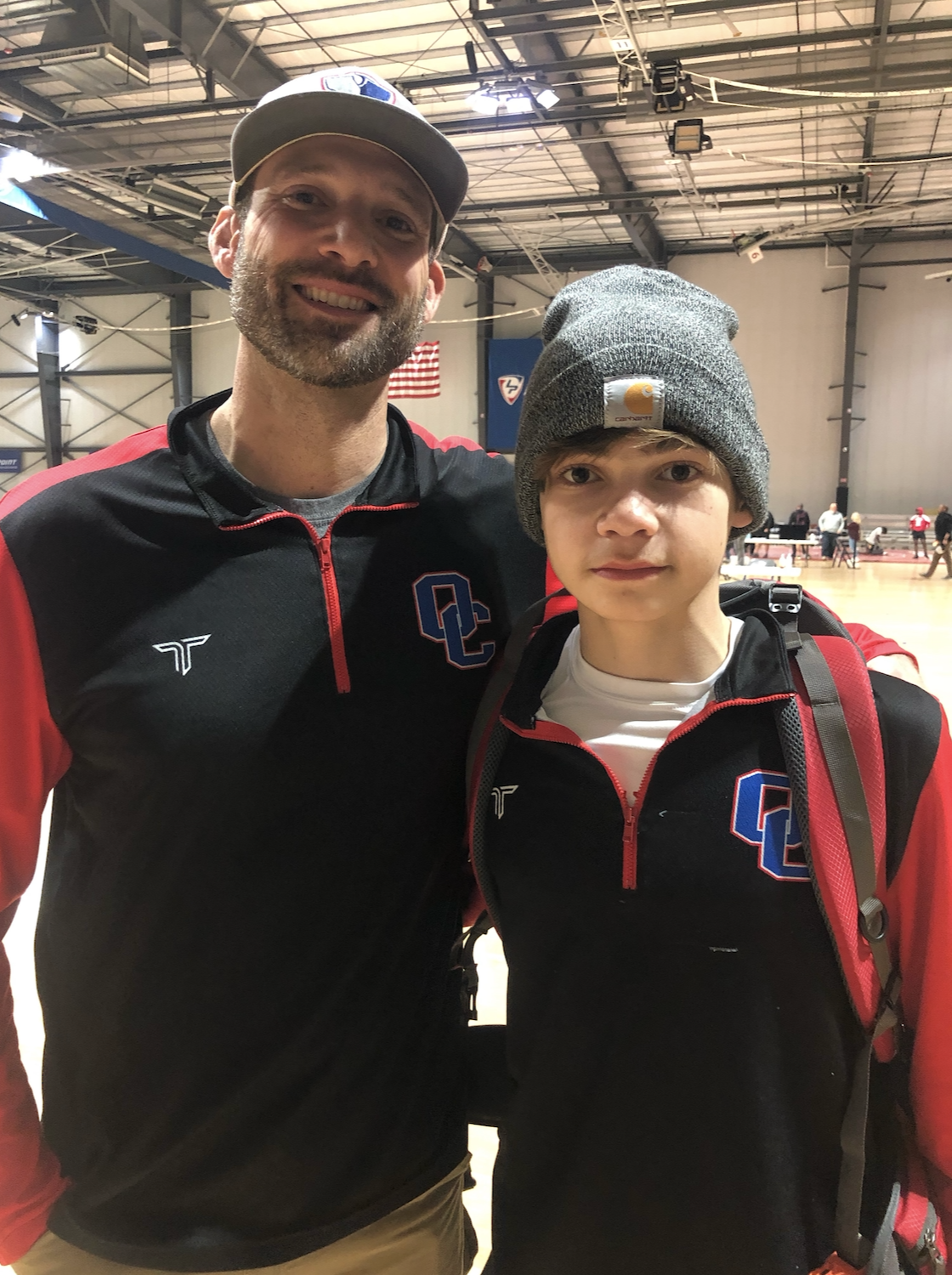 OCHS wrestler Miles Mason (right) said he works well with his father Steve (left) and learns from his dad’s coaching. (Submitted Photo)