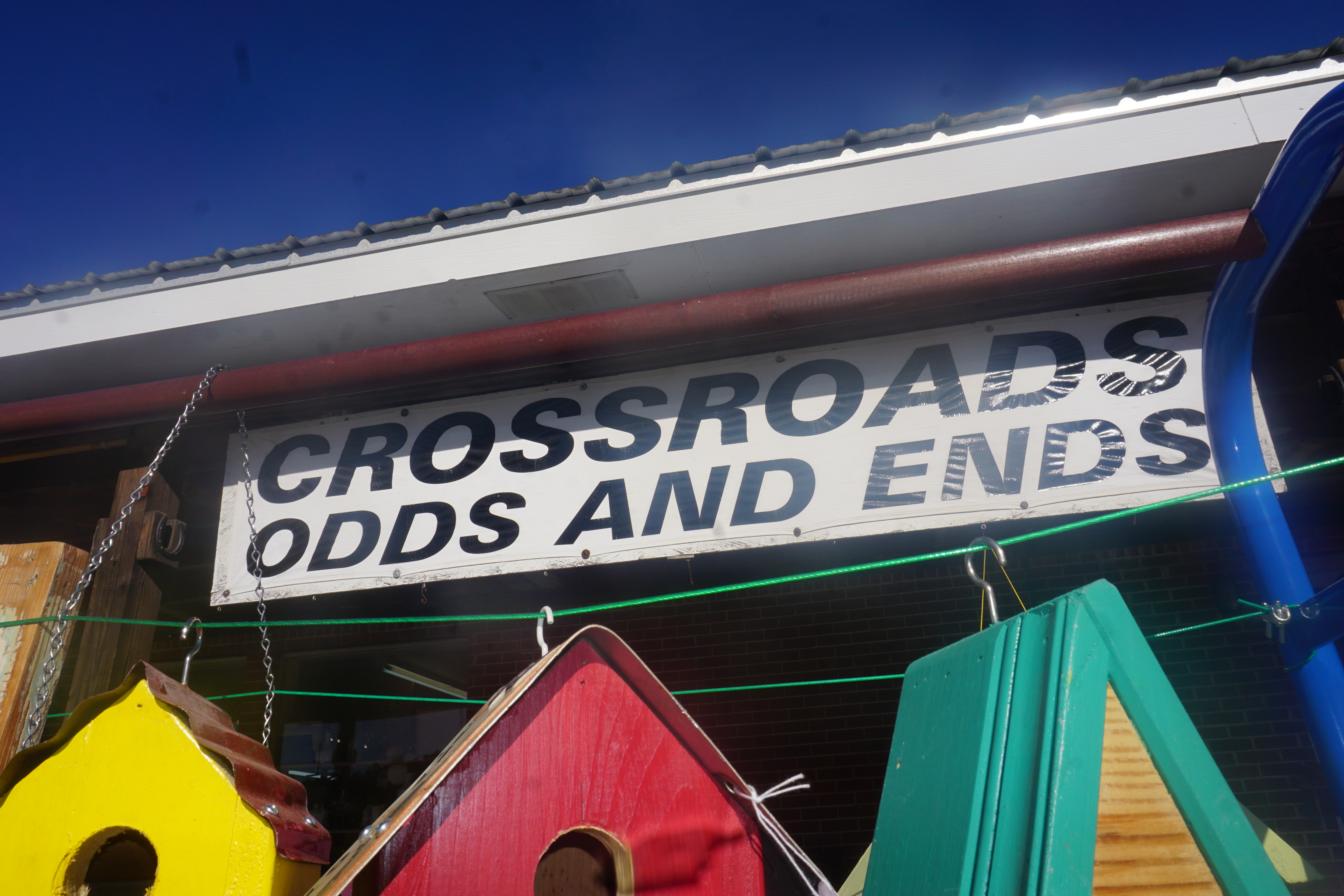 Crossroads Odds and Ends displays hand-crafted bird houses made by owner Randy Patman on Jan. 19, 2023. The store is full of one-of-a-kind items inside and out. (Photo/Sophie McLeod)