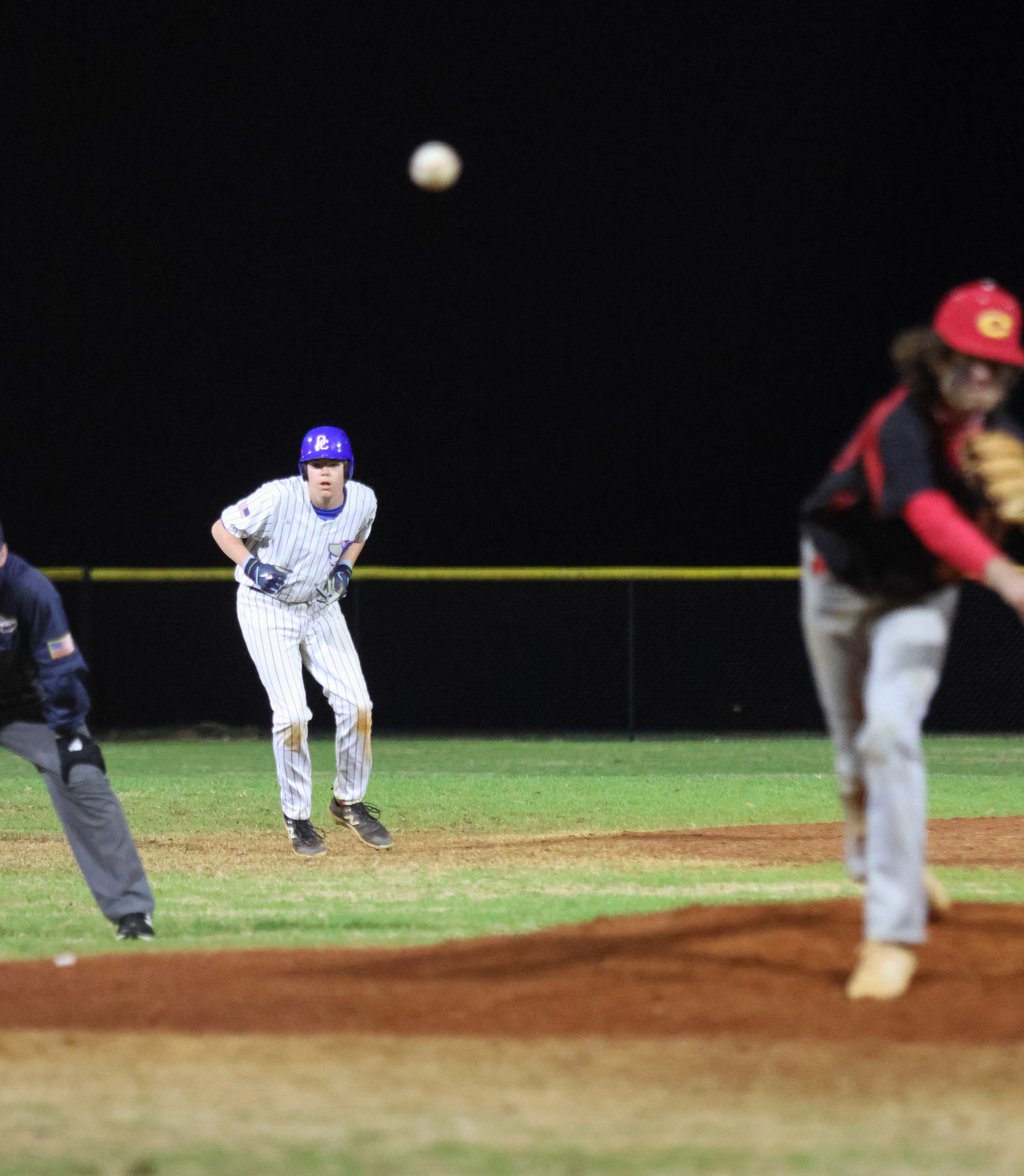 Eli Frost, a sophomore, leads off second base during his teammate's at-bat. (Photo/Emily Dozier)