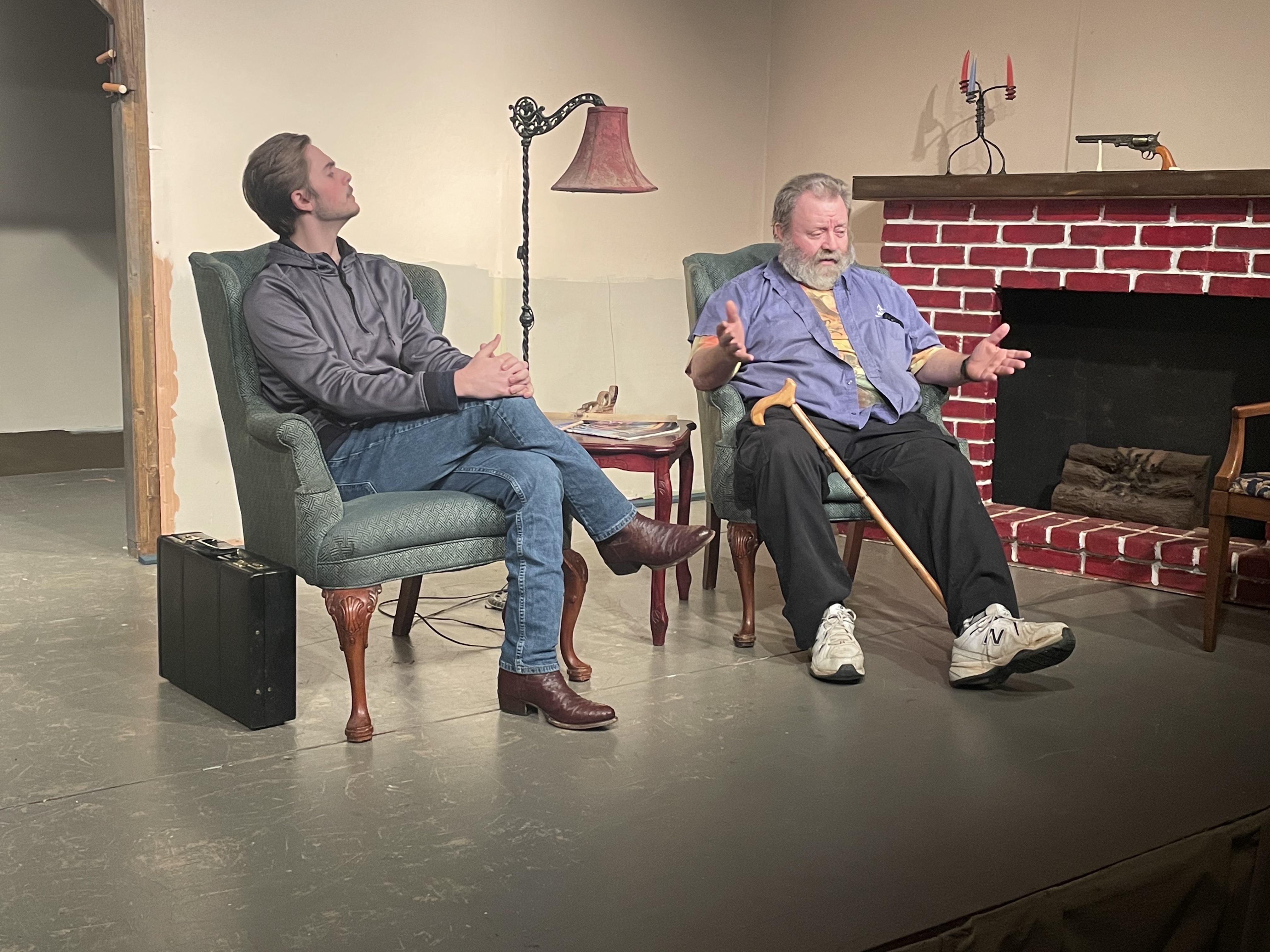 (RAMON ELORTONDO/THE OGLETHORPE ECHO) Cast members Wyatt Herndon (Porter Milgrim) and Dave Bloyer (Sidney Bruhl) practice a scene for Arts!Oglethorpe’s production of "Deathtrap” this month. 