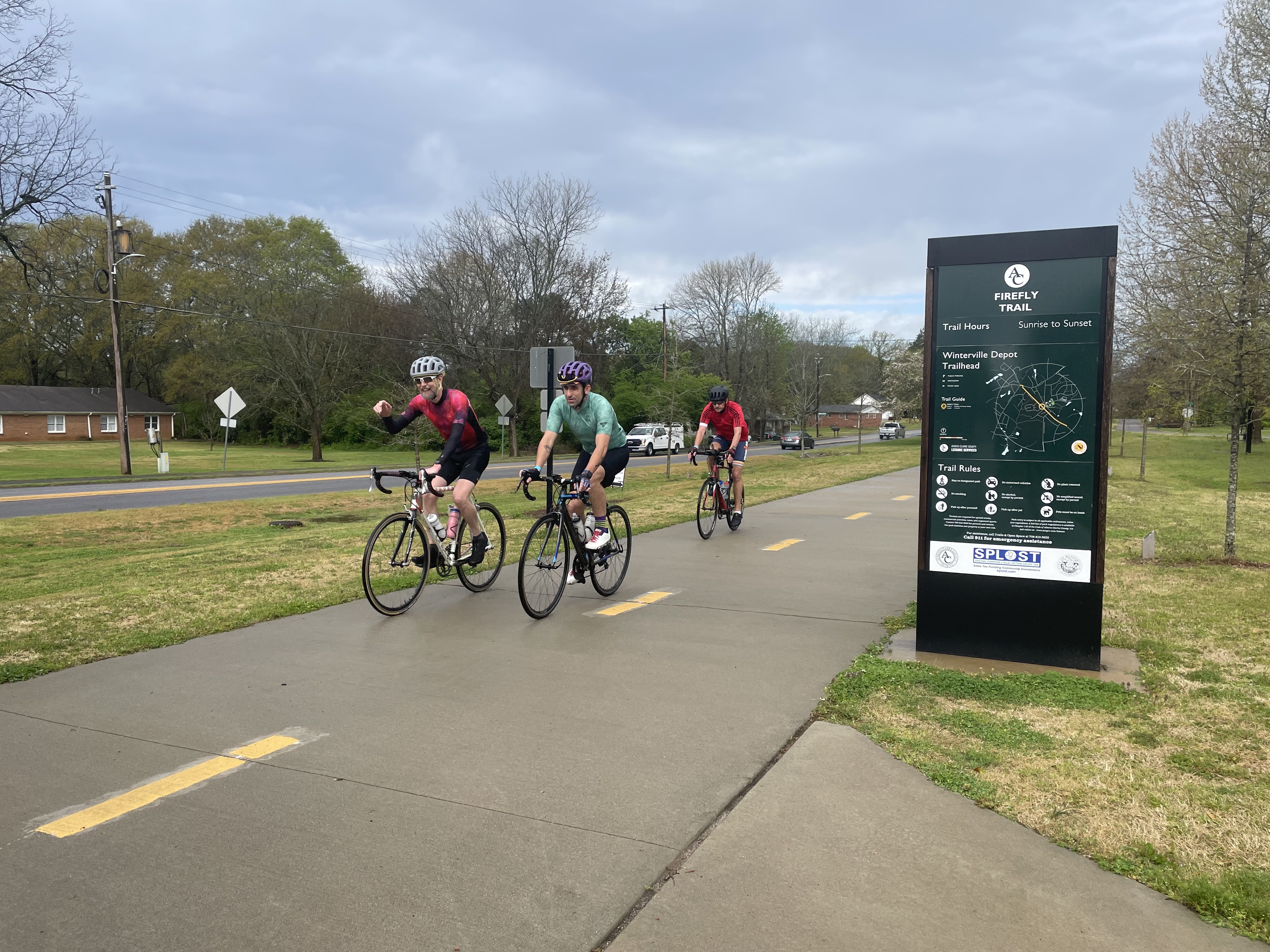Cyclists participating in the Ticket to Ride fundraiser approach the first stop on the Firefly Trail in  Winterville. Firefly Trail Inc. uses the annual event to raise money to complete the 39-mile path from Athens to Union Point. (Photo/Gray Jones)