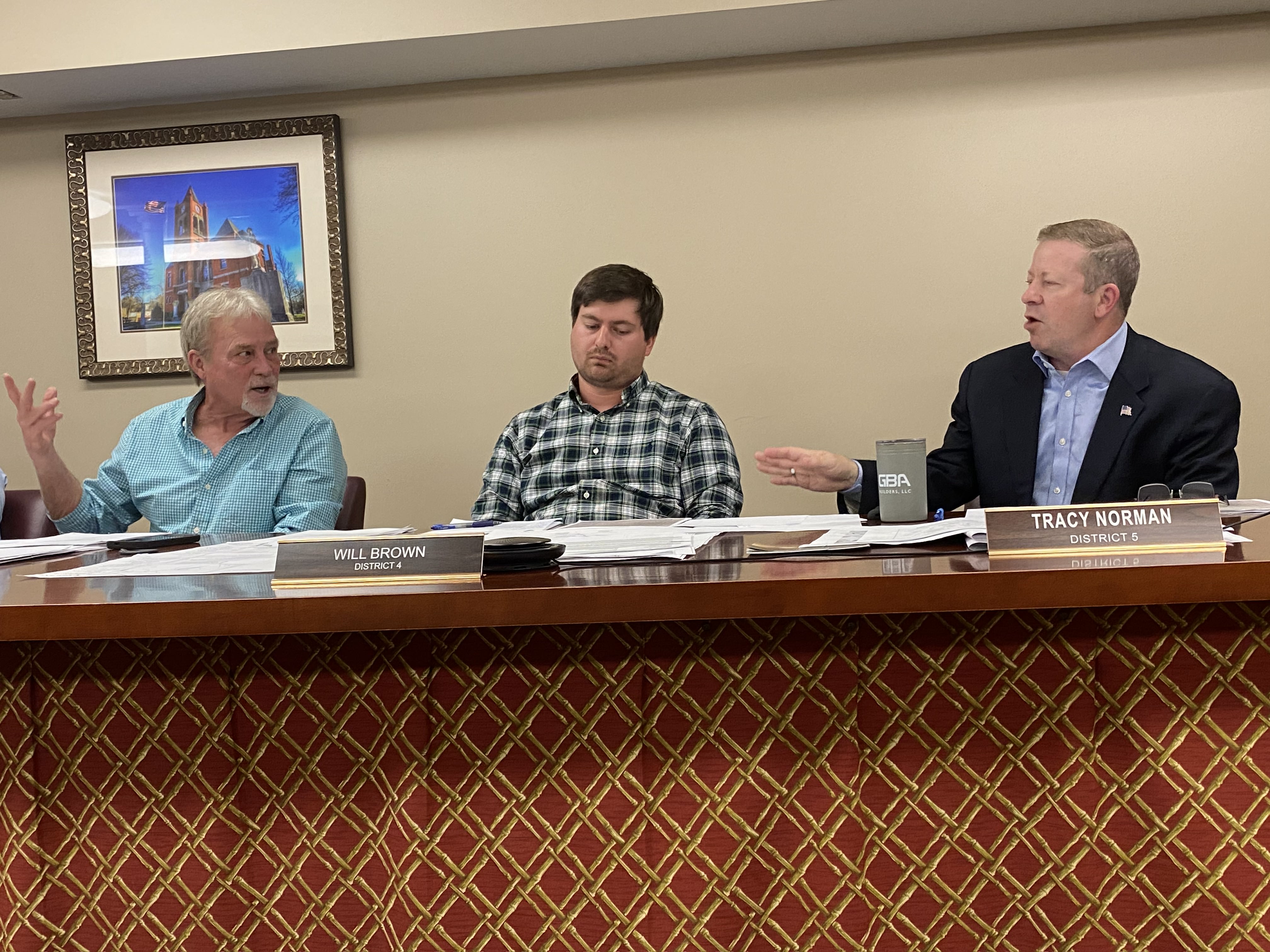 Commissioners Howard Sanders (from left), Will Brown and Tracy Norman discuss adding Hugh Culbreth Road to the truck traffic ordinance during Monday’s commission meeting. (Garrett Kicklighter/The Oglethorpe Echo)