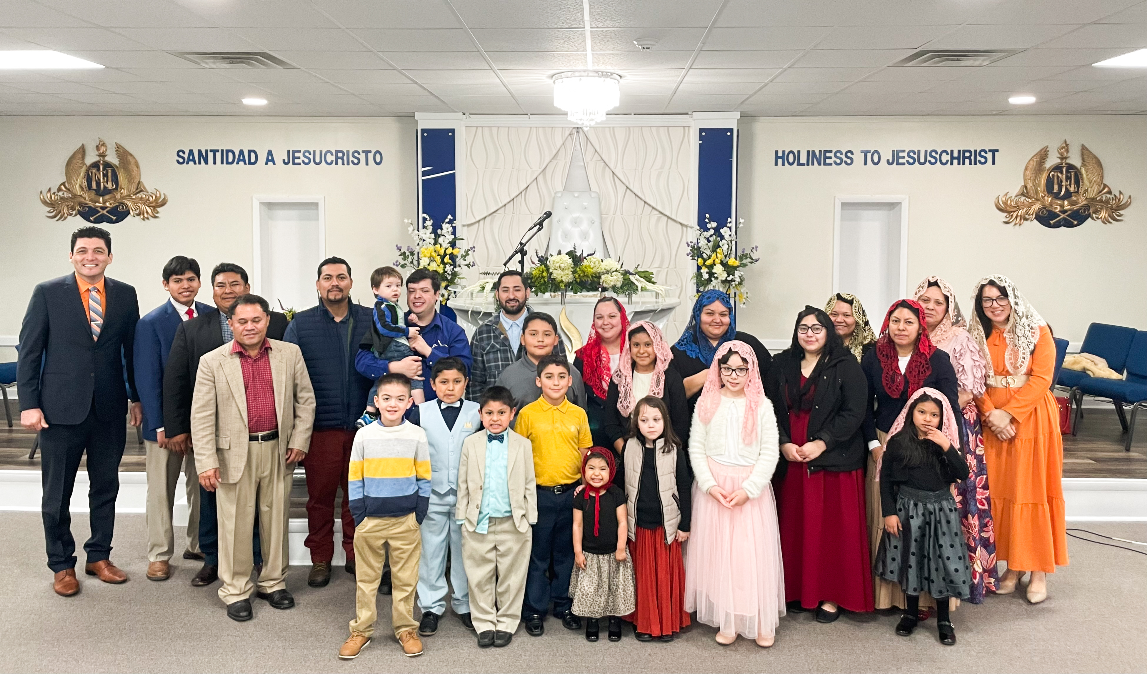 Members of The Light of The World Church congregate in their temple in Lexington earlier this year. The temple opened more than two years ago to provide a home to church members in this area. (Photo/Maddie Daniel)