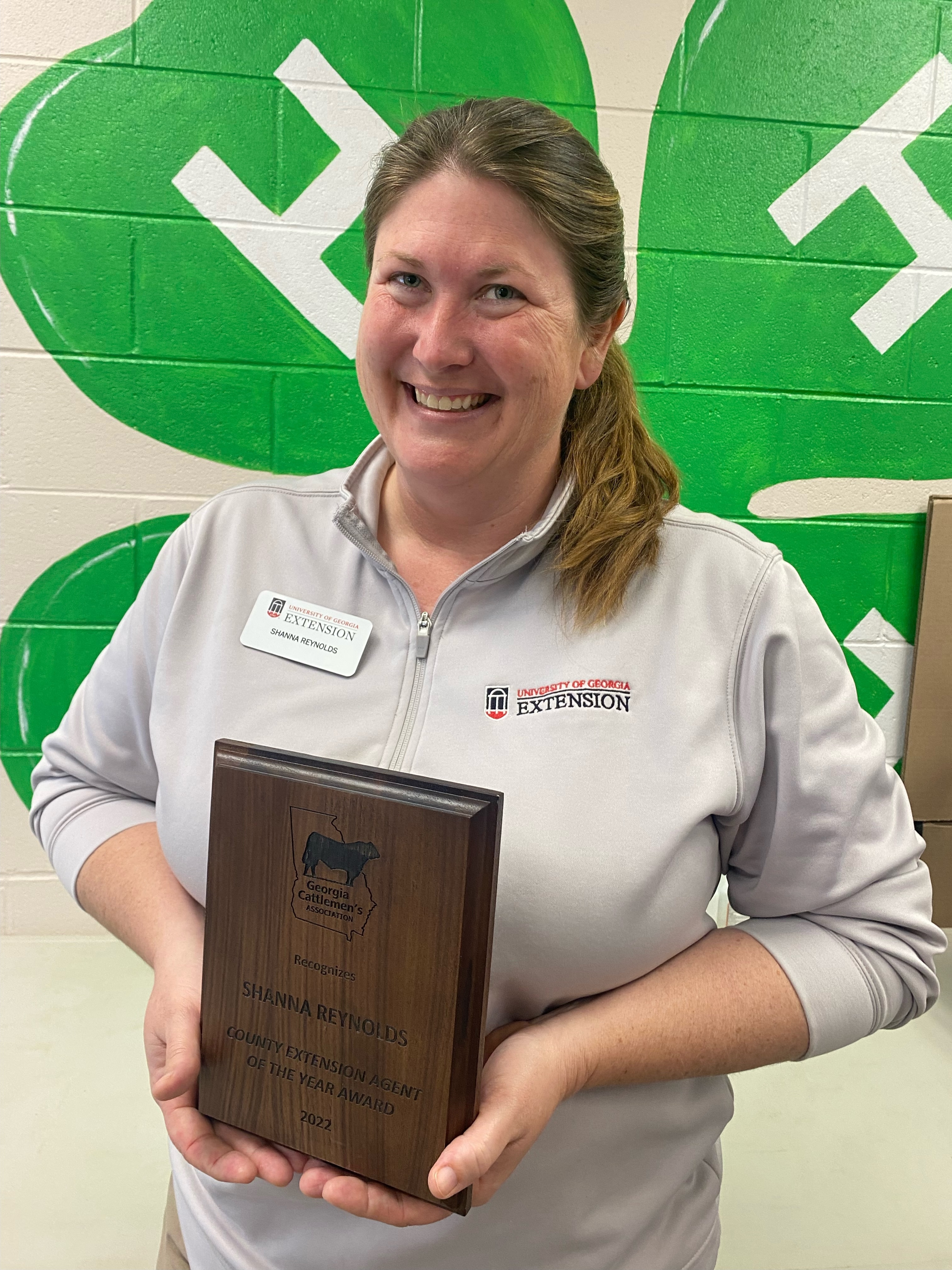 Shanna Reynolds holds the award for the 2022 "County Extension Agent of the Year" she received at the Georgia Cattlemen's Association conference in Columbus, Georgia on March 9, 2023. (Dink Nesmith/ The Oglethorpe Echo)