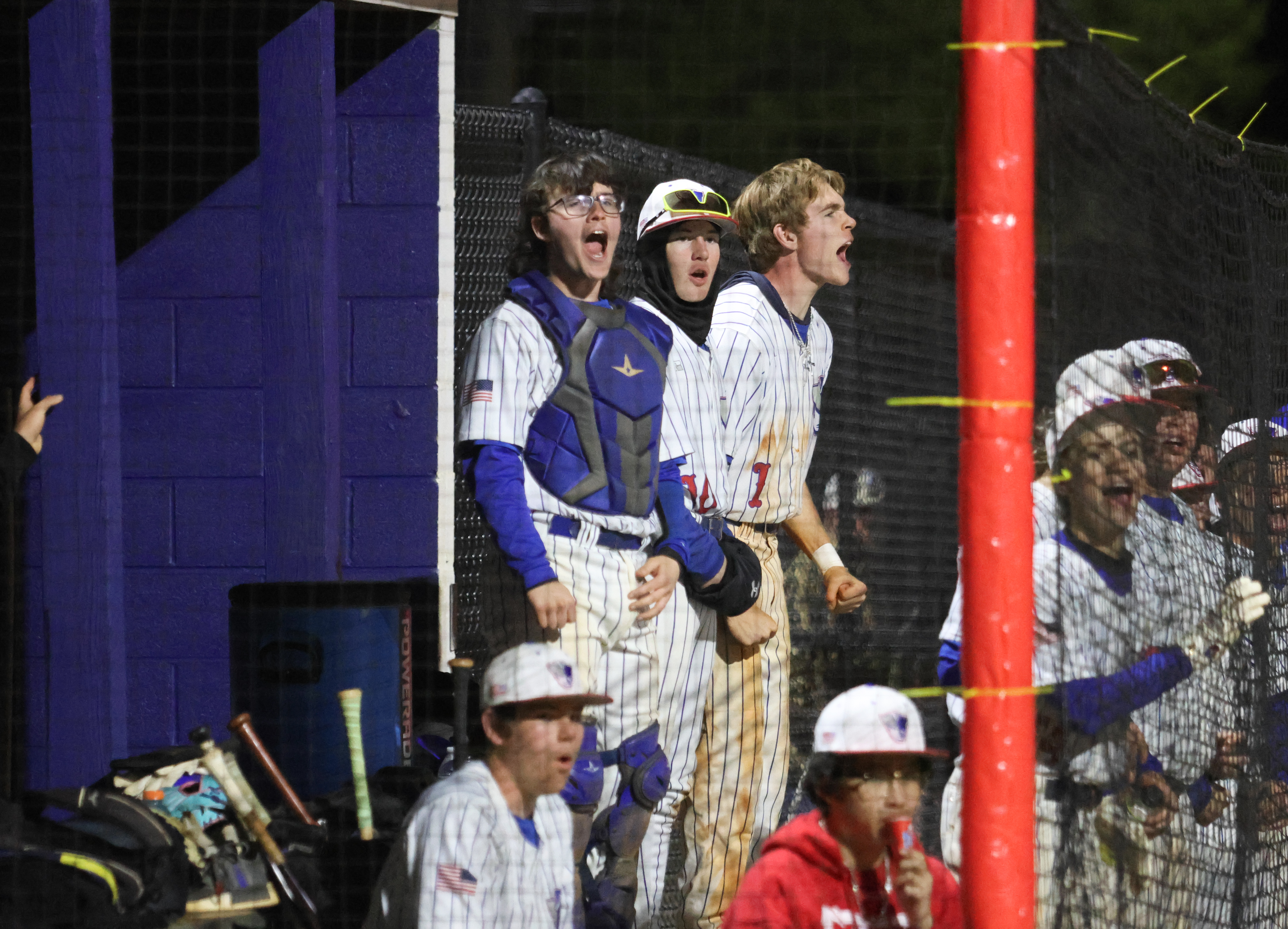 EMILY DOZIER/THE OGLETHORPE ECHO Oglethorpe County’s Daniel Garcia (from left) Austin Lowe and Blane McFarland cheer on their teammates in a 10-9 victory over Clarke Central earlier this season. The Patriots can wrap up the third seed from Region 5-A Division I with a victory over Jasper County.