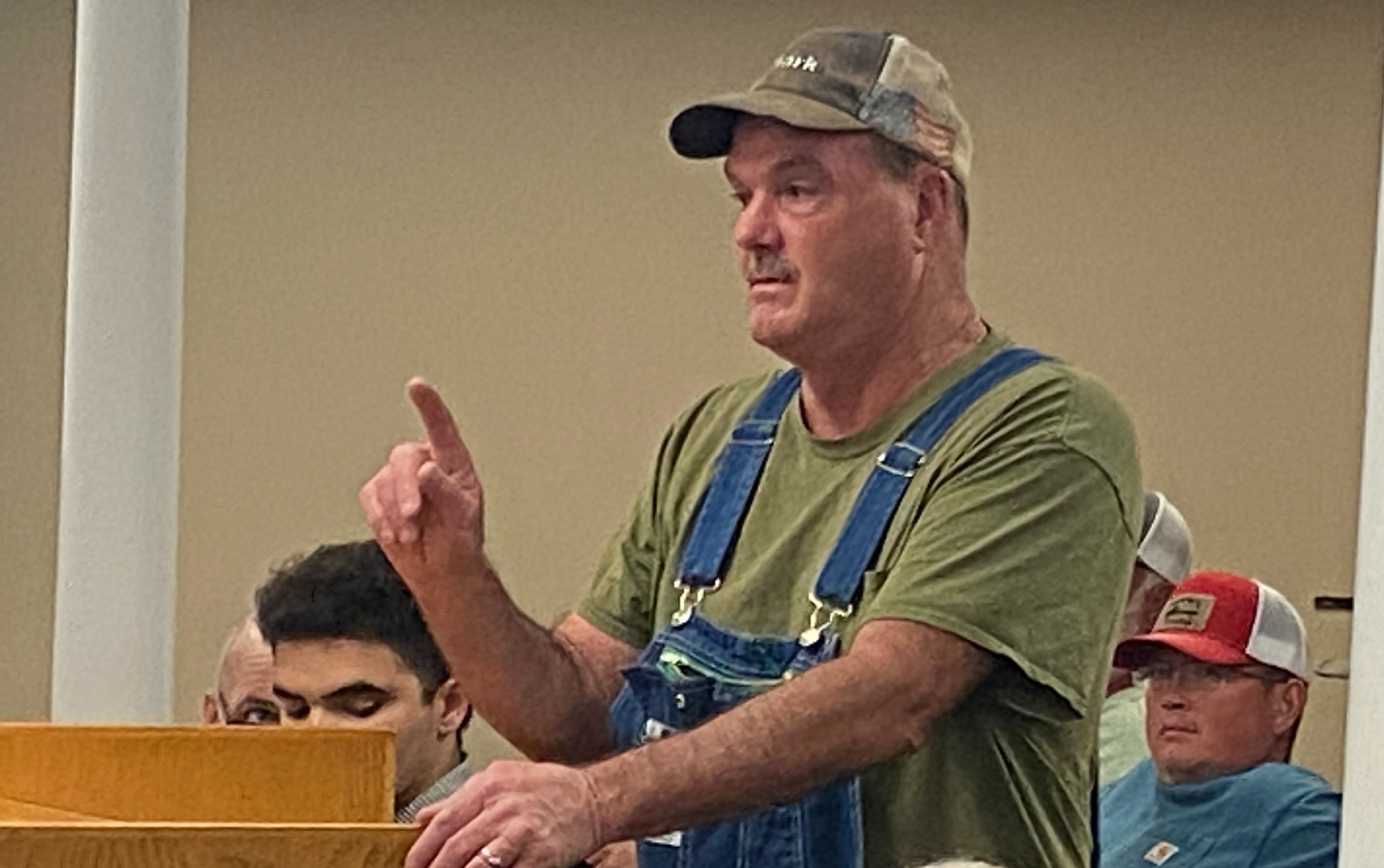 (DINK NESMITH/THE OGLETHORPE ECHO) Brian Angel speaks against a rezoning request to build new poultry houses on Bethesda Church Road. The Board of Commissioners unanimously denied the request in Monday’s meeting.