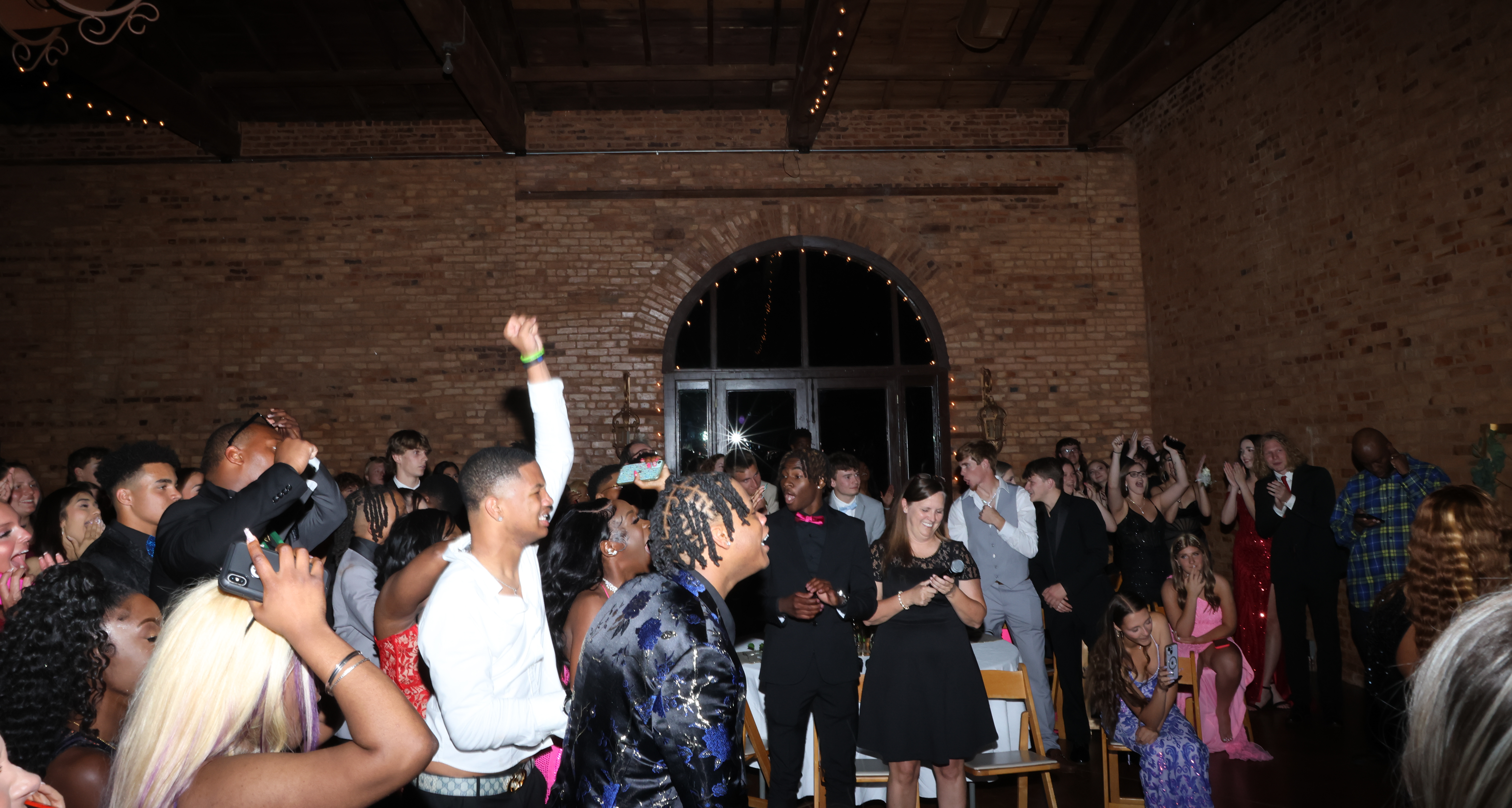 Students react to the announcement of Nadia Henderson as prom queen. (LANDEN TODD/THE OGLETHORPE ECHO)