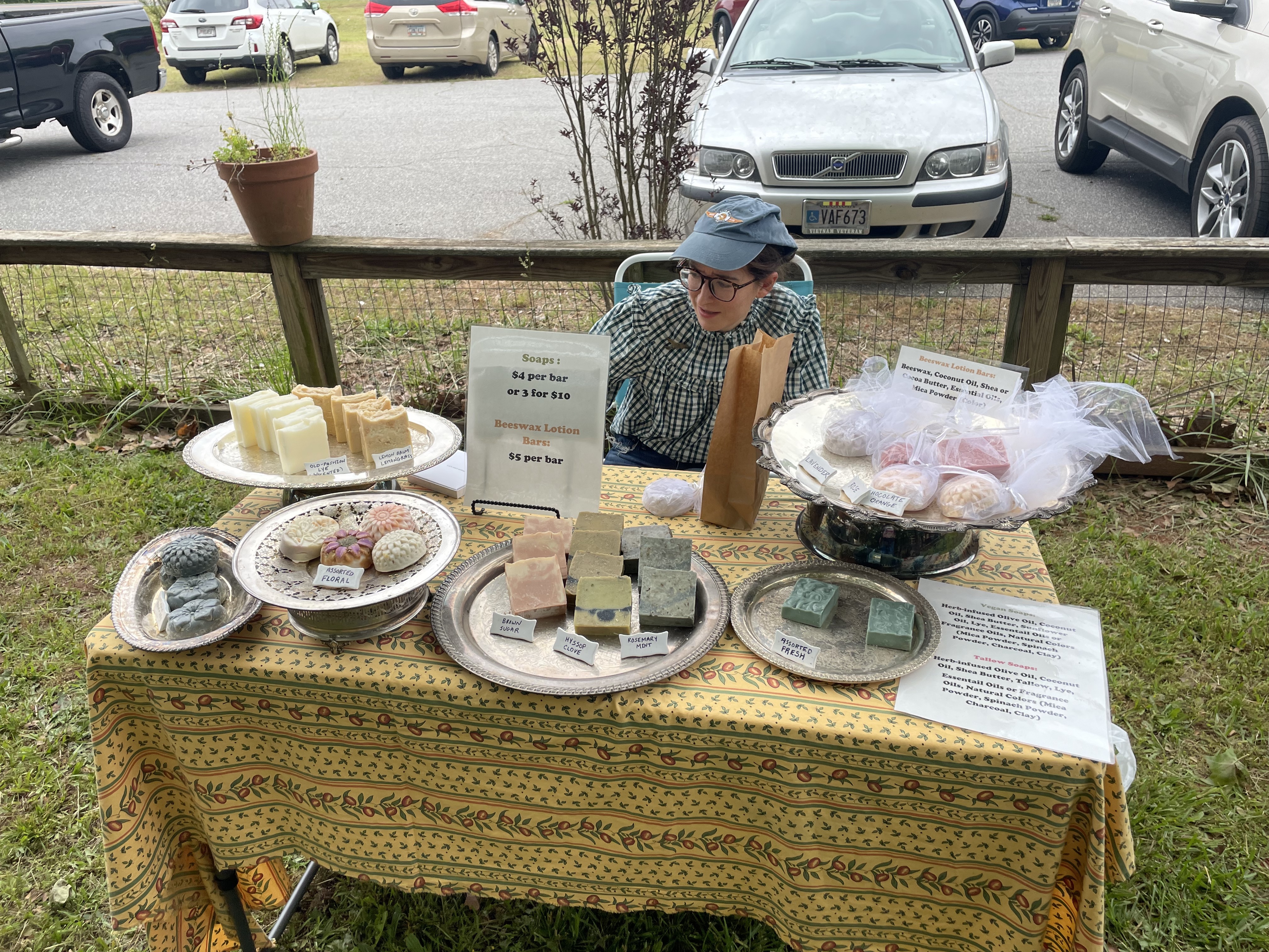 Emily Thomas recently began soap making as a hobby and set up a table at the second annual Art Bazaar and Book Sale, which was held on Saturday at No. 3 Railroad Street in Arnoldsville. "Peggy (Hroma) convinced me to come out here and sell my soap and it has been really successful so far." (RAMON ELORTONDO/THE OGLETHORPE ECHO)