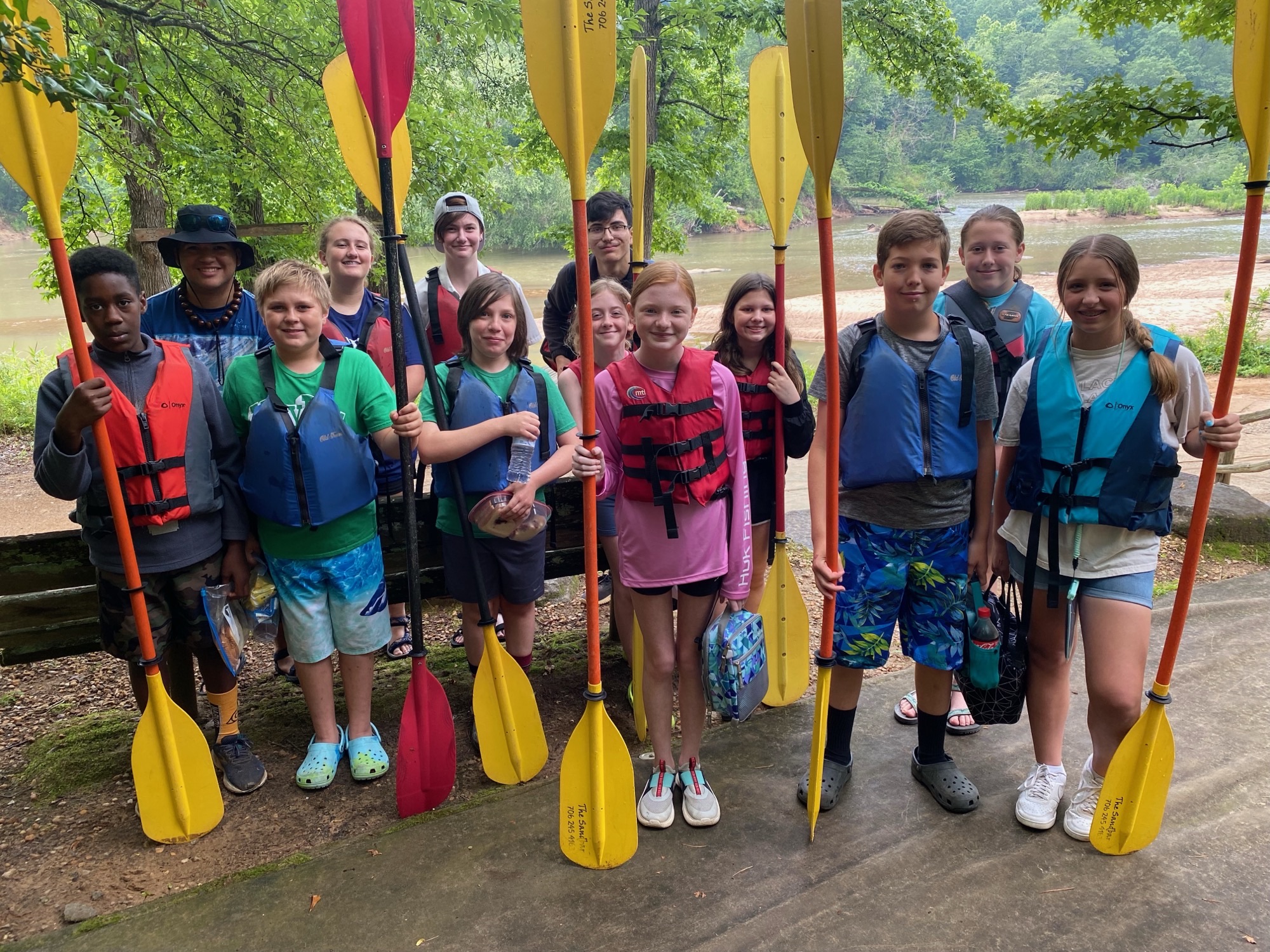 Taylor McGreavy (from left), Justin Loggins, J.T. Mathews, Audrey Green, Devyn Patrick, Jayden McGreavy, Jaxson Blocker, Rebecca Jones, Mae Mathews, McKinley Grimes, Eli Patton, Haleigh Baker and Kiley Paul took part in a kayaking trip. (SUBMITTED PHOTO)