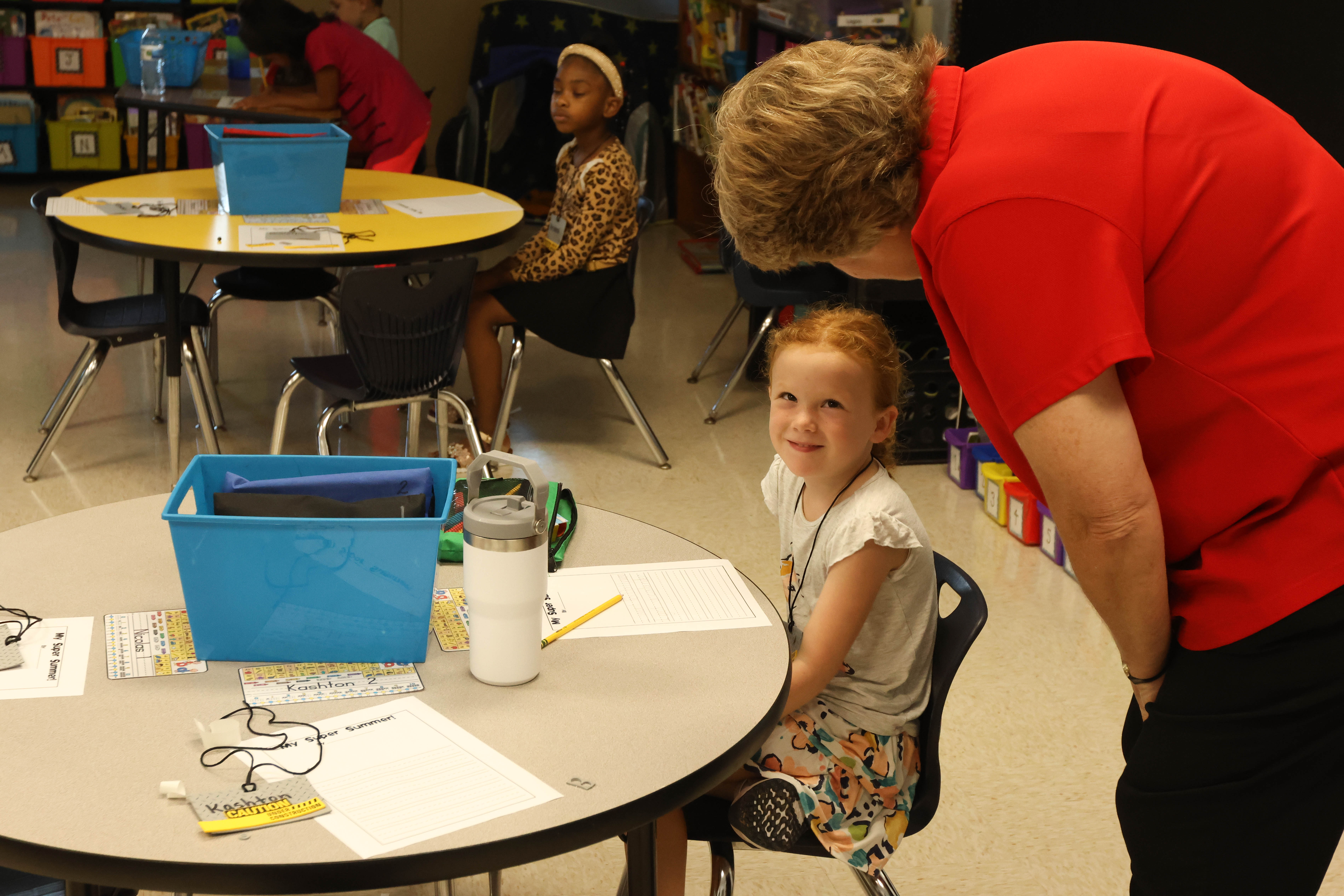 Superintendent Beverley Levine chats with a student at Oglethorpe County Primary School on the first day of the school year. (LANDEN TODD/THE OGLETHORPE ECHO)