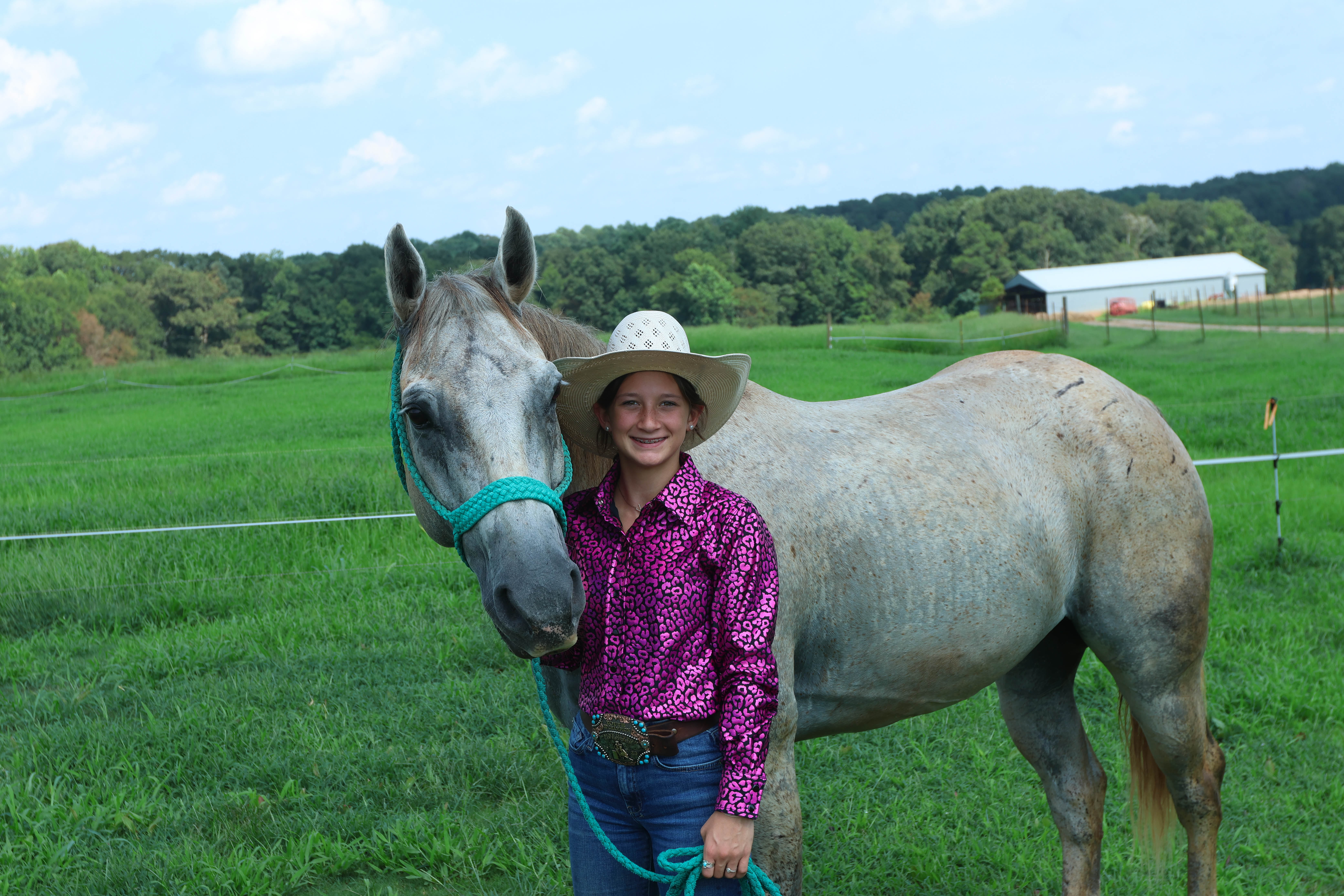 Kenzie Erwin, along with her horse Badger, has won three belt buckles in the 2022-23 season for her rodeo skills, which include goat tying and barrel racing. (LANDEN TODD/THE OGLETHORPE ECHO)
