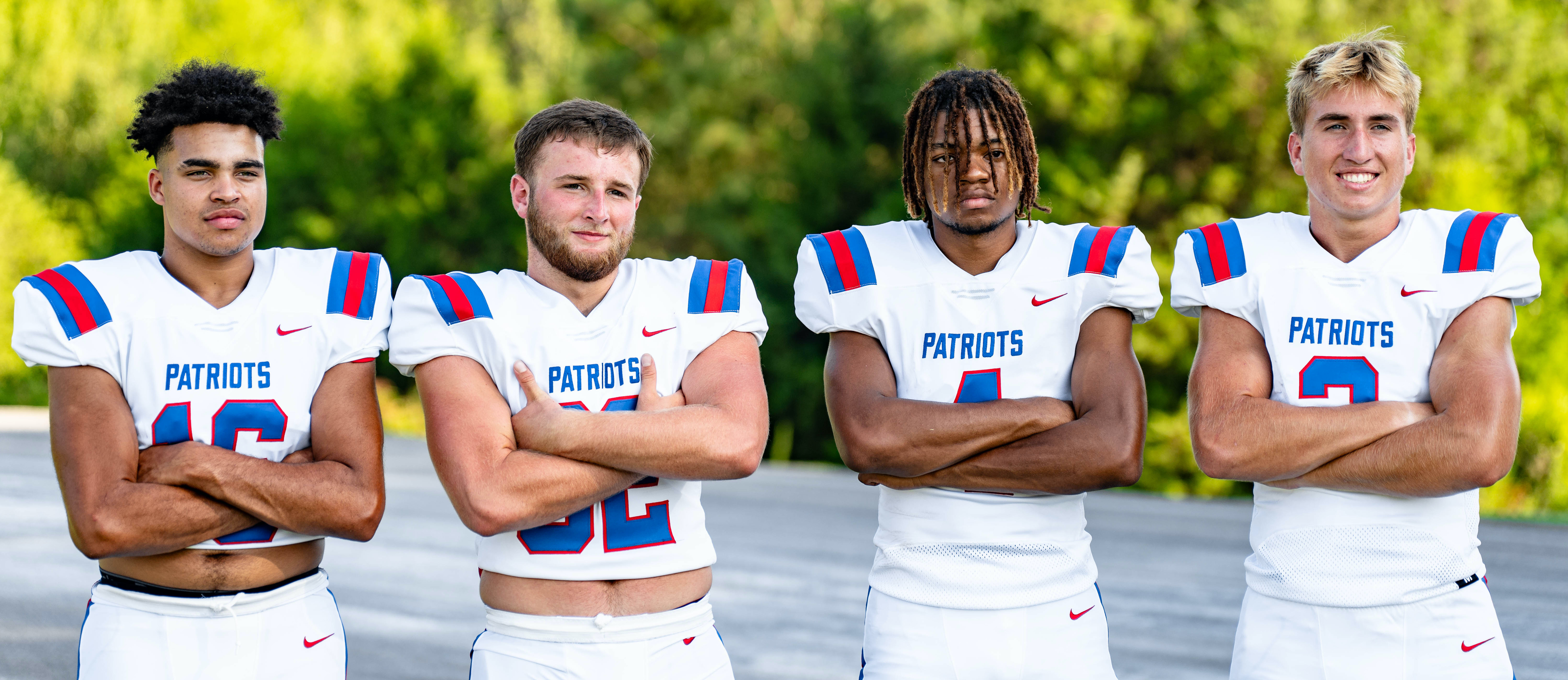 Seniors Quintin Nash (from left), Caleb Hall, Elijah Hood and Jake Turner show off Oglethorpe County’s new Nike uniforms during the team’s photo day on July 31. The program made the switch from Adidas to Nike this summer. (JACK CASEY/THE OGLETHORPE ECHO)