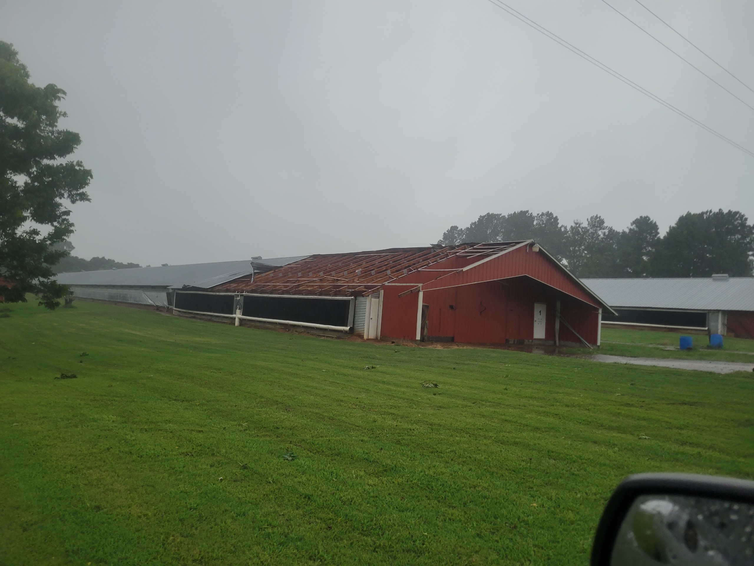 The roof was blown off a chicken house on Howard Sanders’ farm in Stephens during the storm on July 20 that blew down trees and knocked out power across the county. Sanders said the roof has been repaired. (SUBMITTED PHOTO)