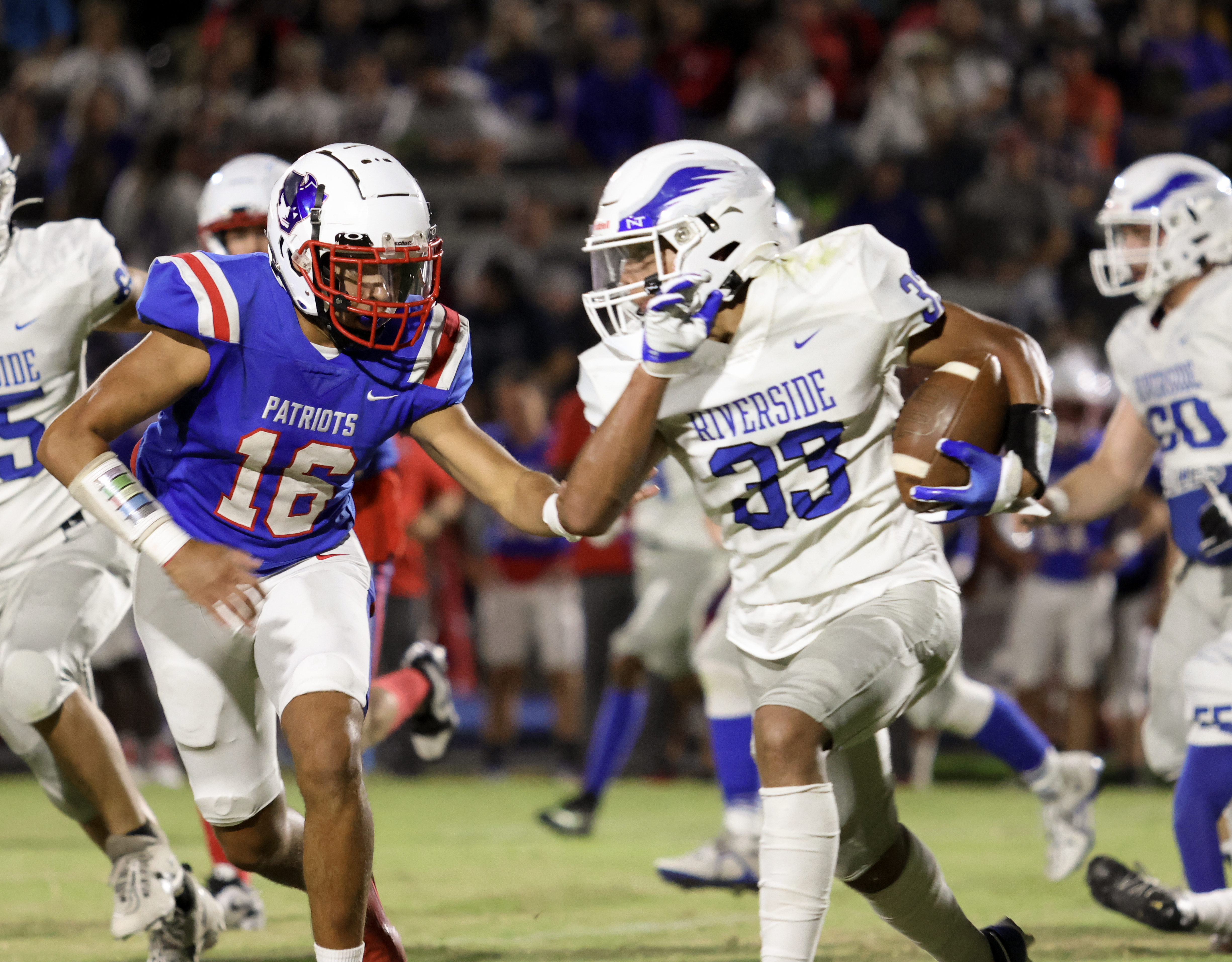 Oglethorpe County’s Quentin Nash tracks down Riverside Military Academy’s Jacques Chiller in the Patriots’ 57-0 homecoming victory on Friday night. OCHS had eight tackles for loss, two safeties and an interception. (NATHALEE SIMONEAU/THE OGLETHORPE ECHO)