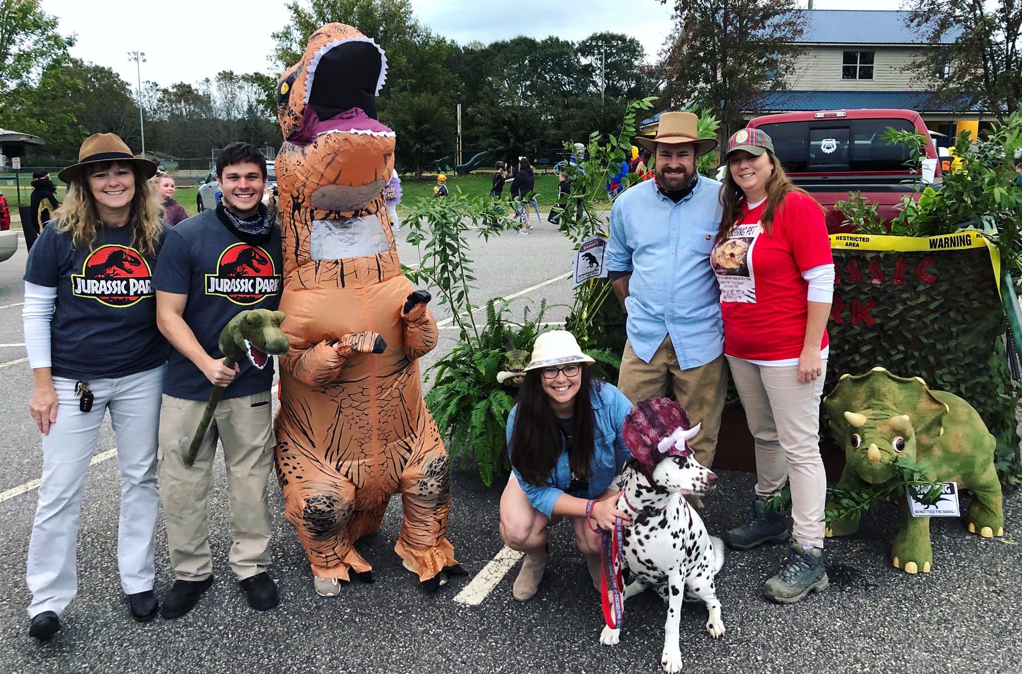 Lisa Porterfield (from left), Dylan Fields, Kelli Porterfield, Kristin Young, Paul Mixon, Tina Mixon and Hercules the Dalmation enjoy a recent Trunk or Treat at the rec department. This is the seventh year the rec department has held the event.