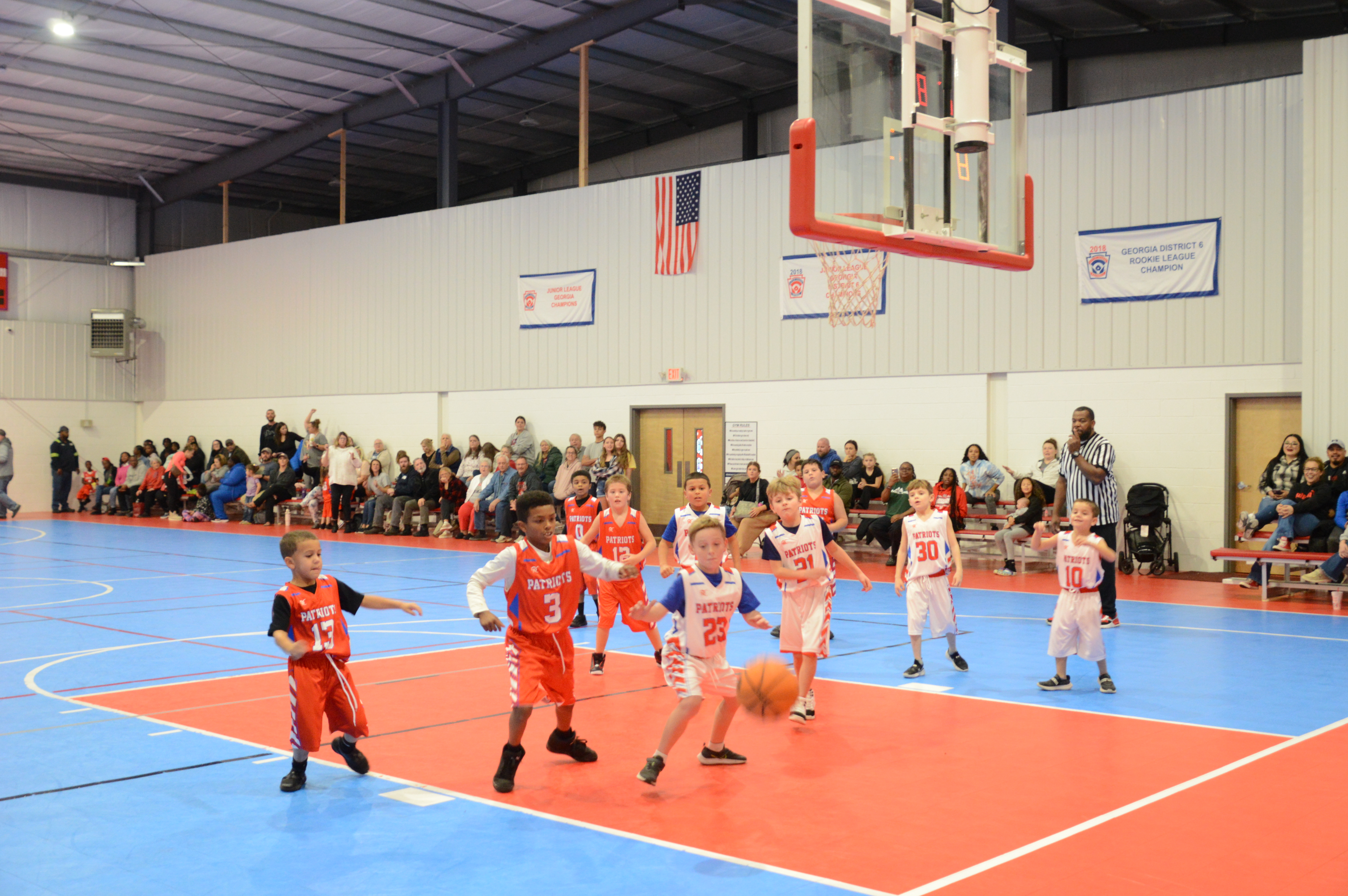 Crowds gather to watch a youth basketball game at the Oglethorpe County Recreation Department on Dec. 5. Stands on both courts in the gym were packed with parents and other attendees. Recreation Department staff say space is at a premium with continued growth in their athletic programs. (McCain Bracewell/The Oglethorpe Echo)