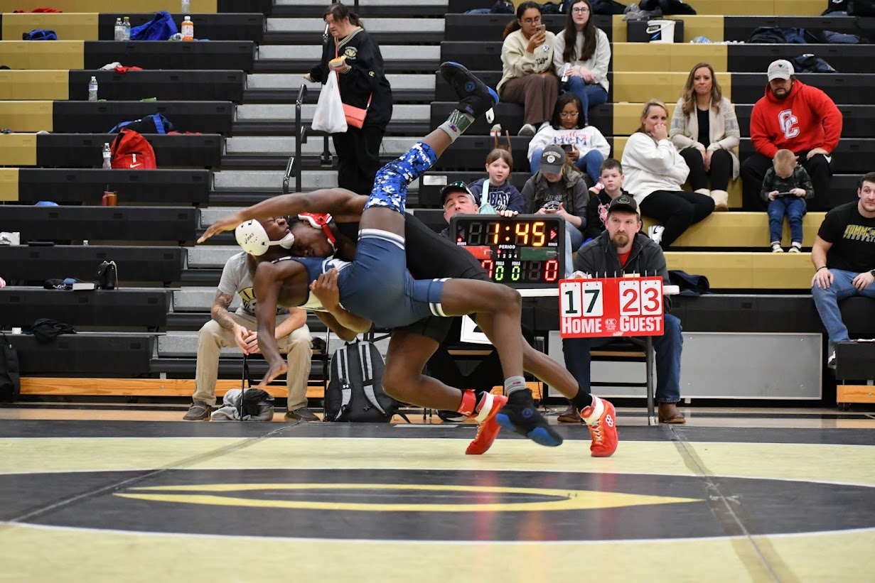 Oglethorpe County’s Paris Crowder, a freshman, takes down his Elbert County opponent during the area team duals on Saturday. The Patriots defeated the Blue Devils to advance to the area final against Commerce. (Wade Cheek/For the Oglethorpe Echo)
