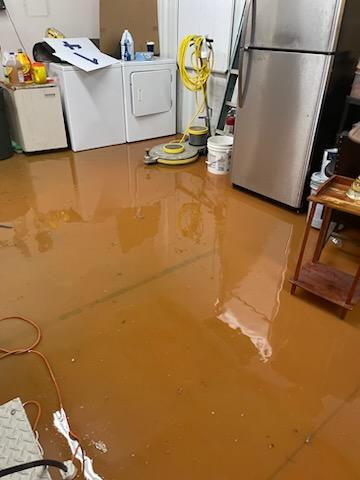 The Emergency Medical Services office on Athens Road flooded last Tuesday when the stormwater ditch behind the building overflowed. (Submitted Photo)
