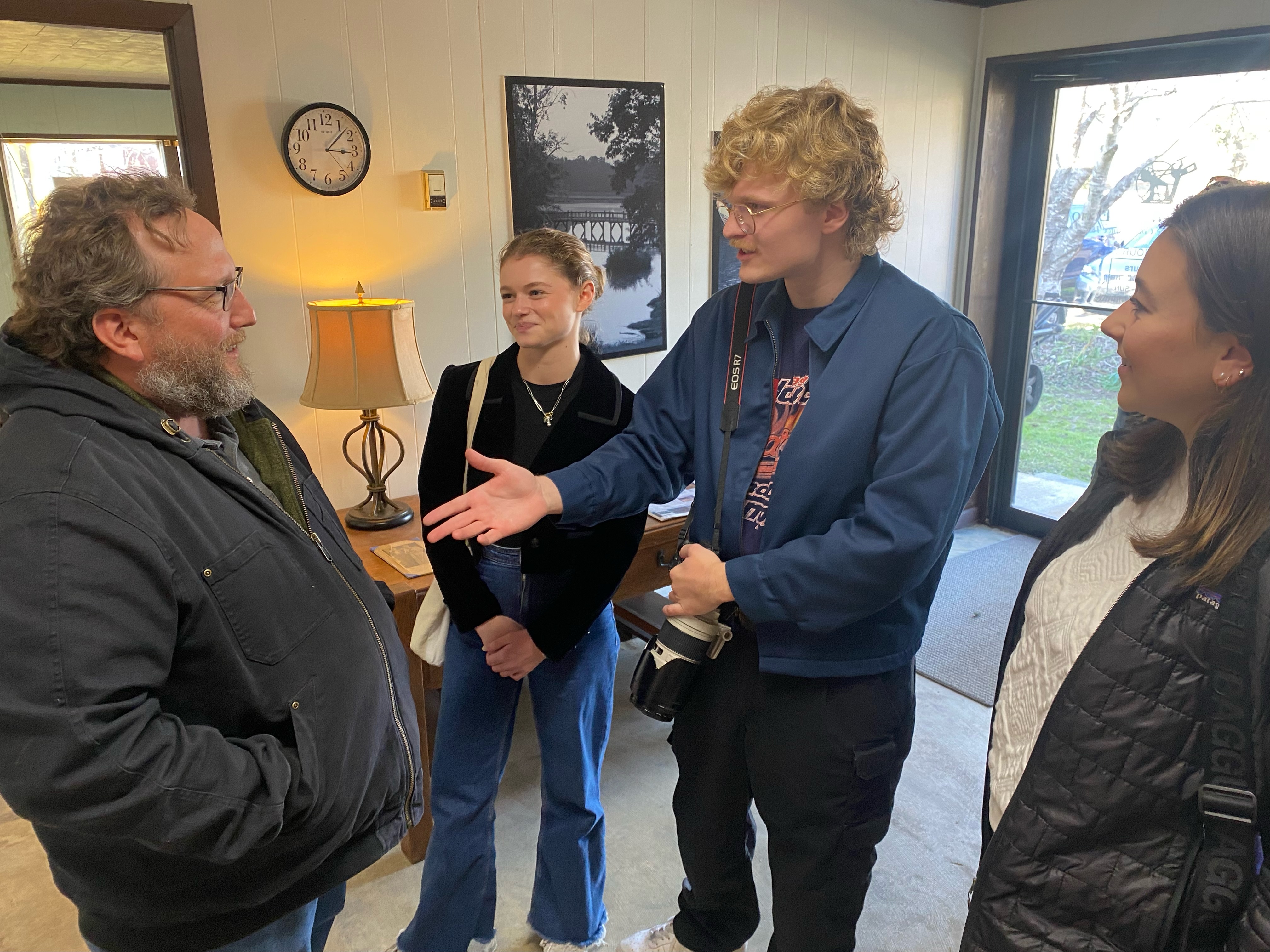 Paul Thiel, director of operations for the Oglethorpe County School District, talks with Margaux Binder, business and infrastructure, and Jim Bass and Ellie Pool, education and schools reporters. (Photo/Dink NeSmith)