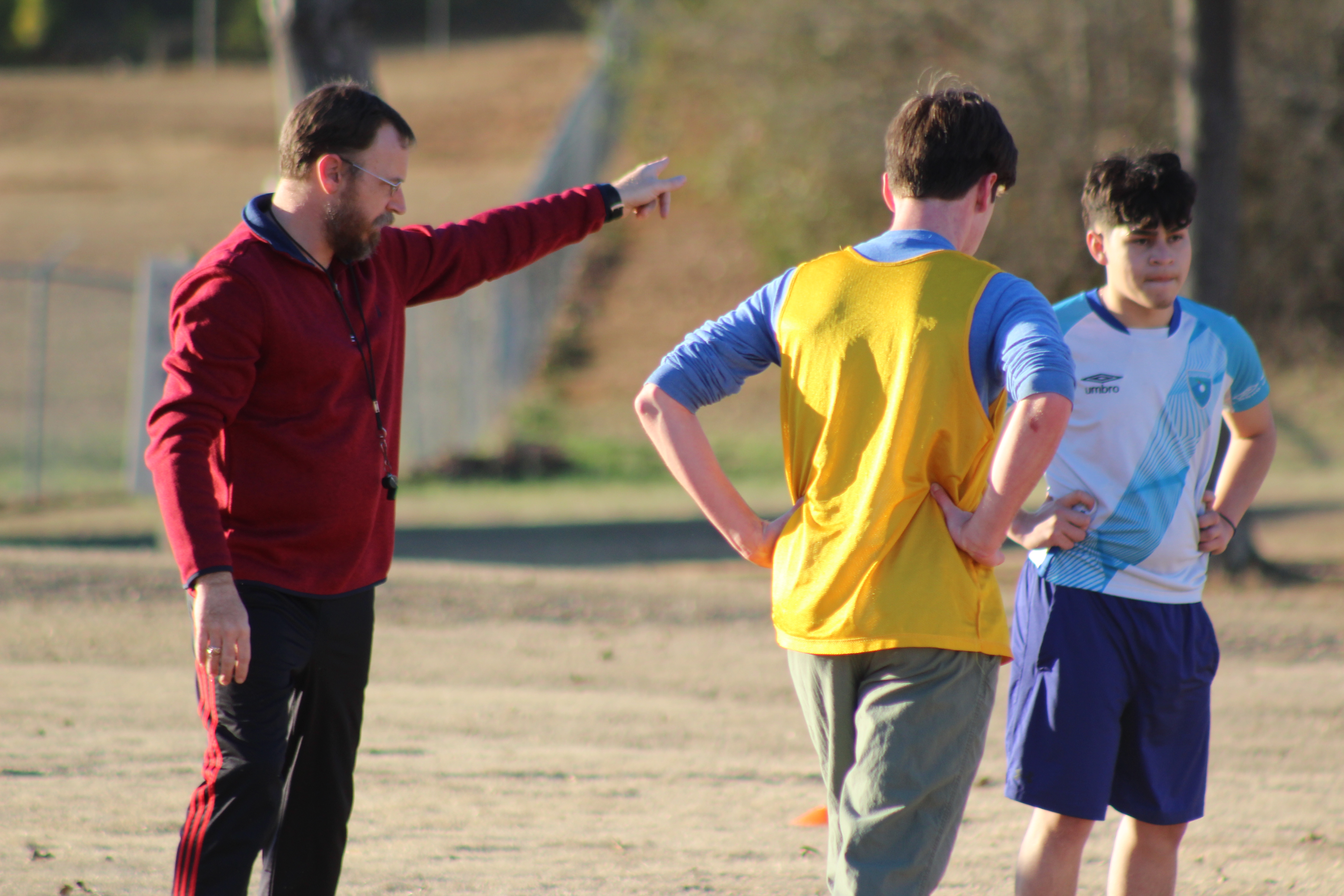 Erich Forschler directs players at the OCHS practice last week. (Samuel Higgs/The Oglethorpe Echo)