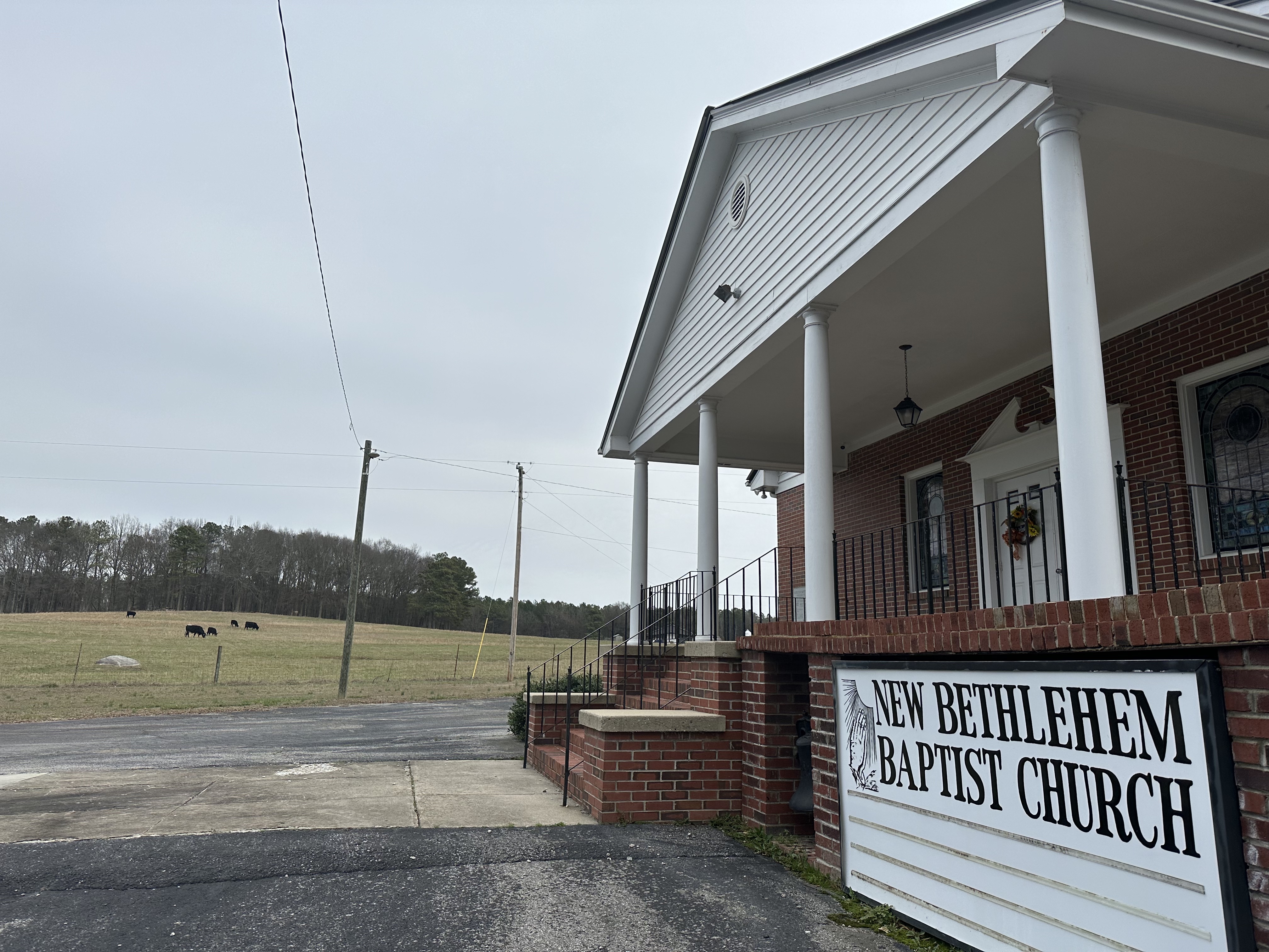 New Bethlehem Baptist Church is located in Carlton, Georgia. It is surrounded by farmland and contains a small school behind the church building. (Photo/Izzy Wagner)