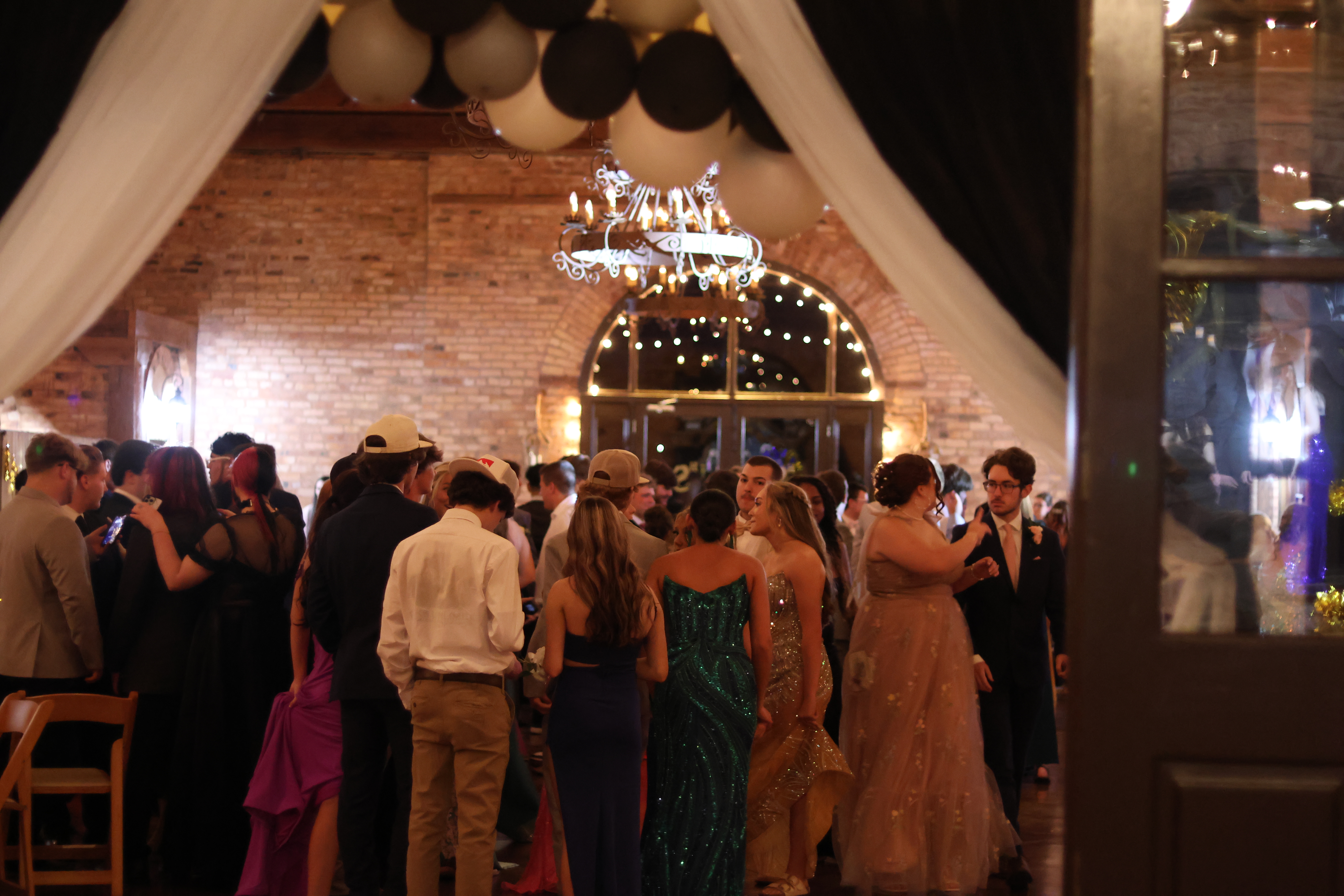 Students begin to form on the dance floor during the Oglethorpe County High School Prom at Historic Smithonia Farm in Colbert, Georgia on April 20, 2024. (Photo/Jim Bass)