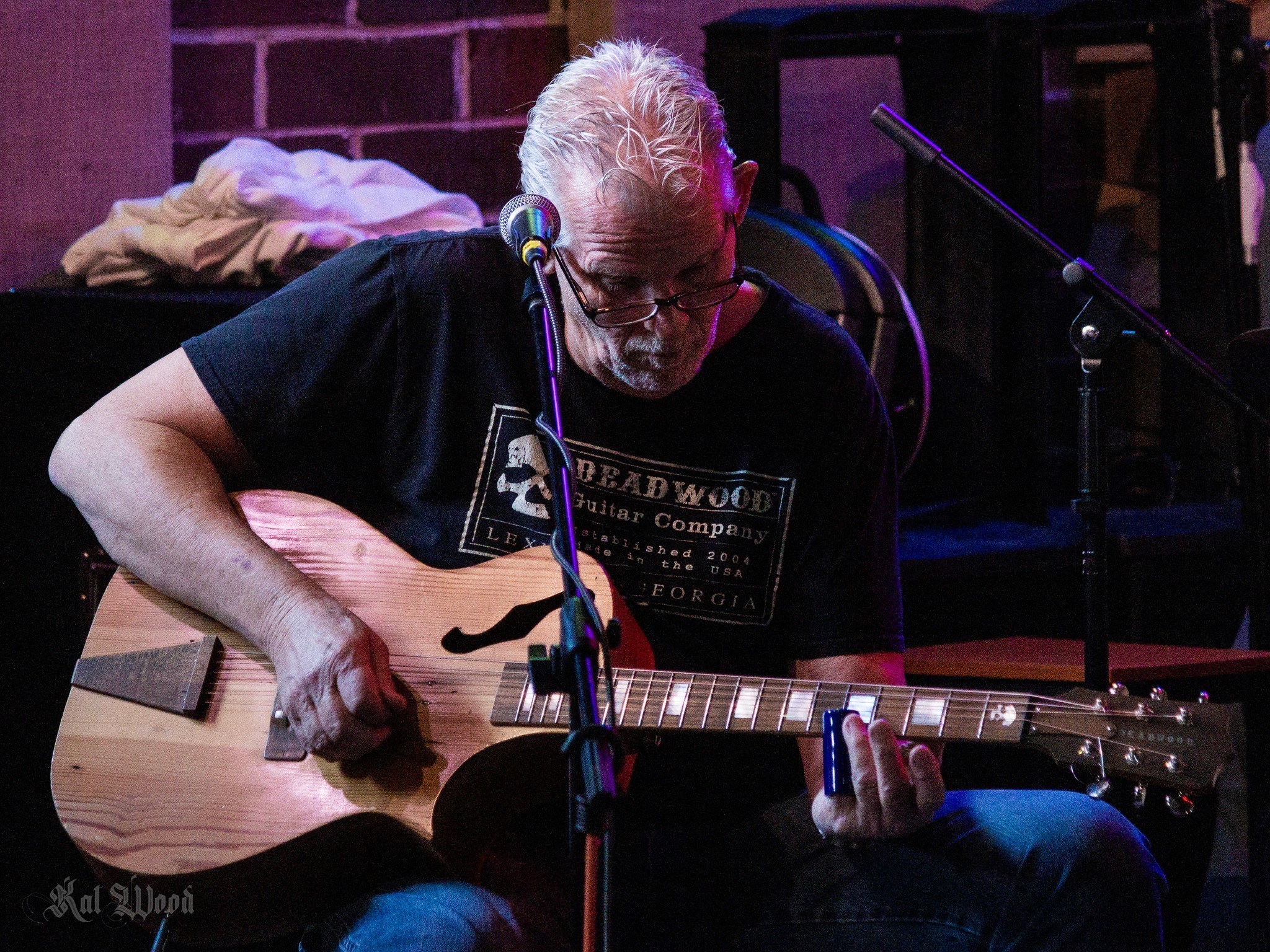 Michael Doke, who lives in Sandy Cross, is a member of the Rick Fowler Band. He plays acoustic sets on Deadwood guitars, which are made by the Lexington company. (Submitted Photo)