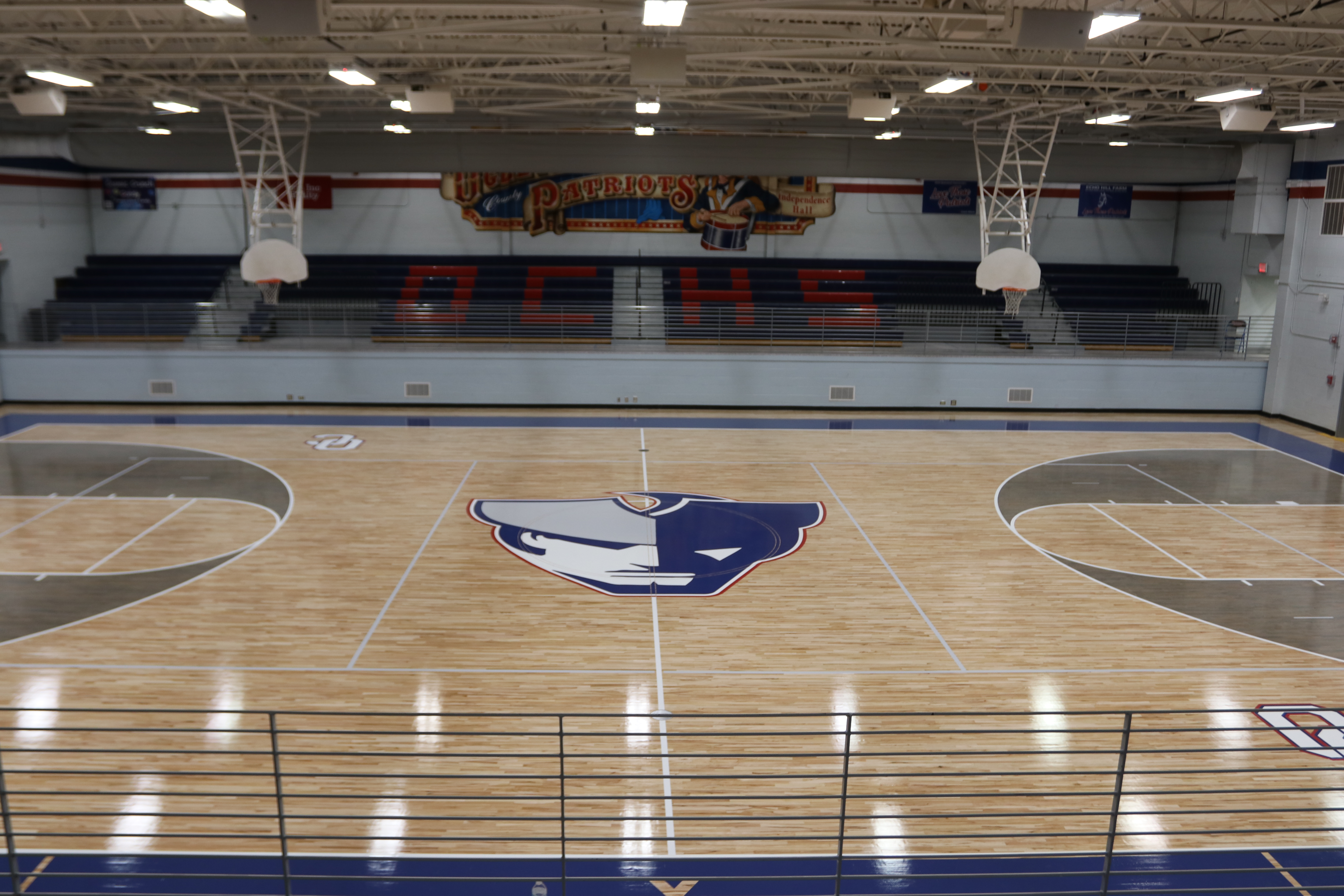 The OCHS gym floor was recently refinished and a modern Patriot head logo replaced the old “OC” at center court. Oglethorpe County School System director of operations Paul Thiel said he wanted to brighten up the gym with a lighter polyurethane finish on the hardwood. (Torin Smith/The Oglethorpe Echo)