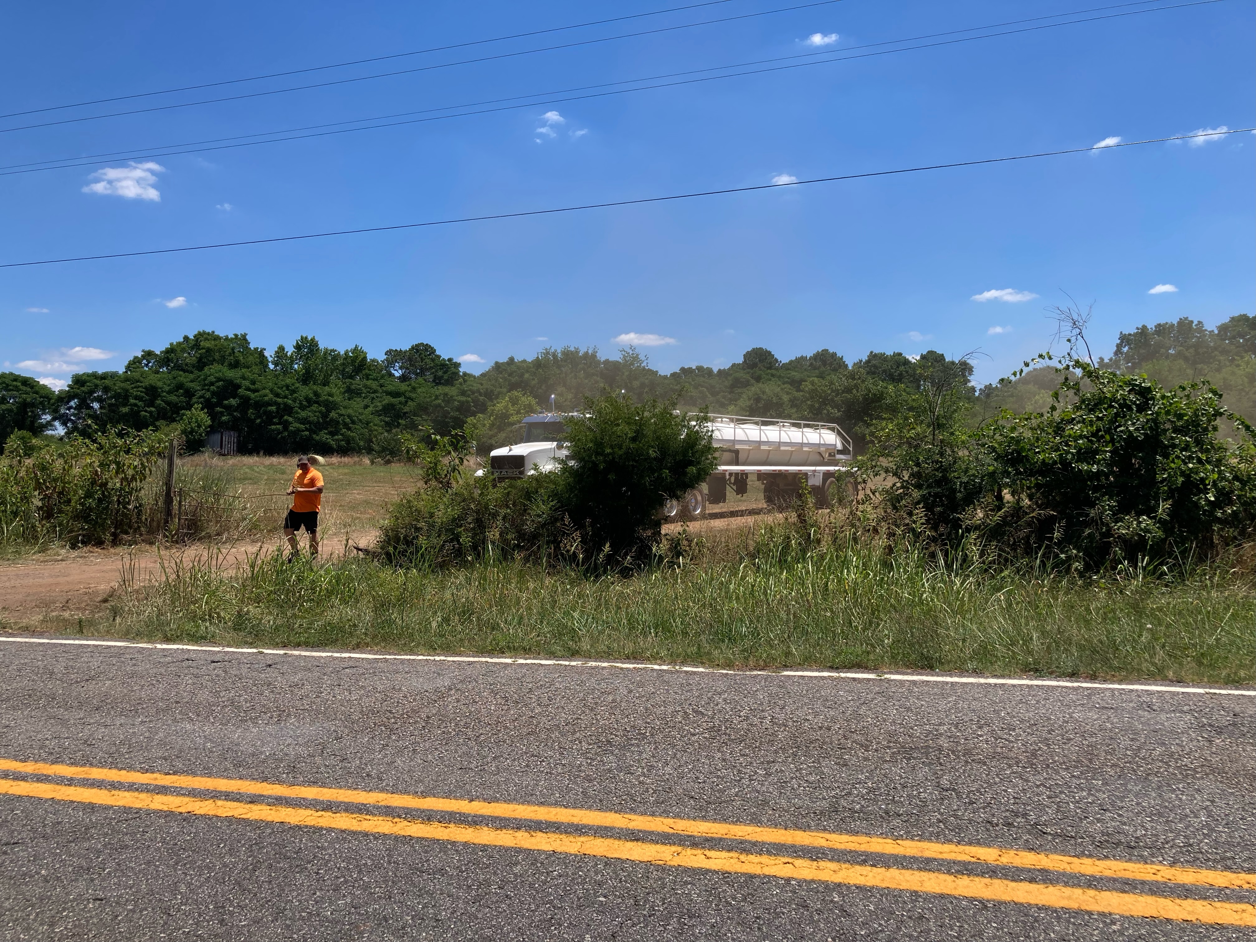 Sludge trucks have been a common sight along Wolfskin Road this summer, residents said, leaving them to complain about the smell. Commission chair Jay Paul said “people are becoming more and more cautious” about using sludge. (Wingate Downs/For The Oglethorpe Echo)