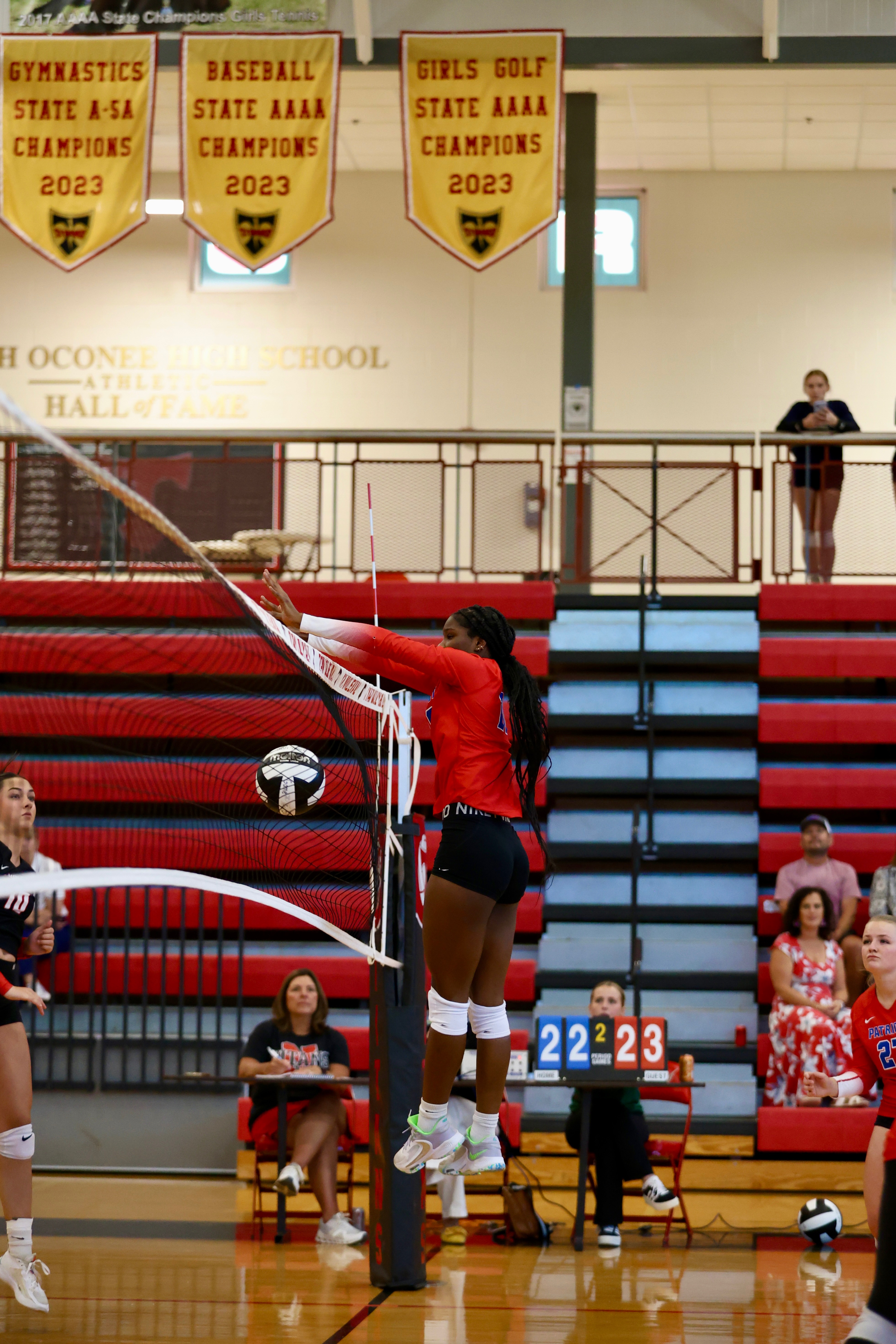 OCHS volleyball’s Kenzie Henderson soars above the net in a match last week at North Oconee. The Patriots are off to a 2-0 start in Area 8-A. (TY JOHNSTON/THE OGLETHORPE ECHO)