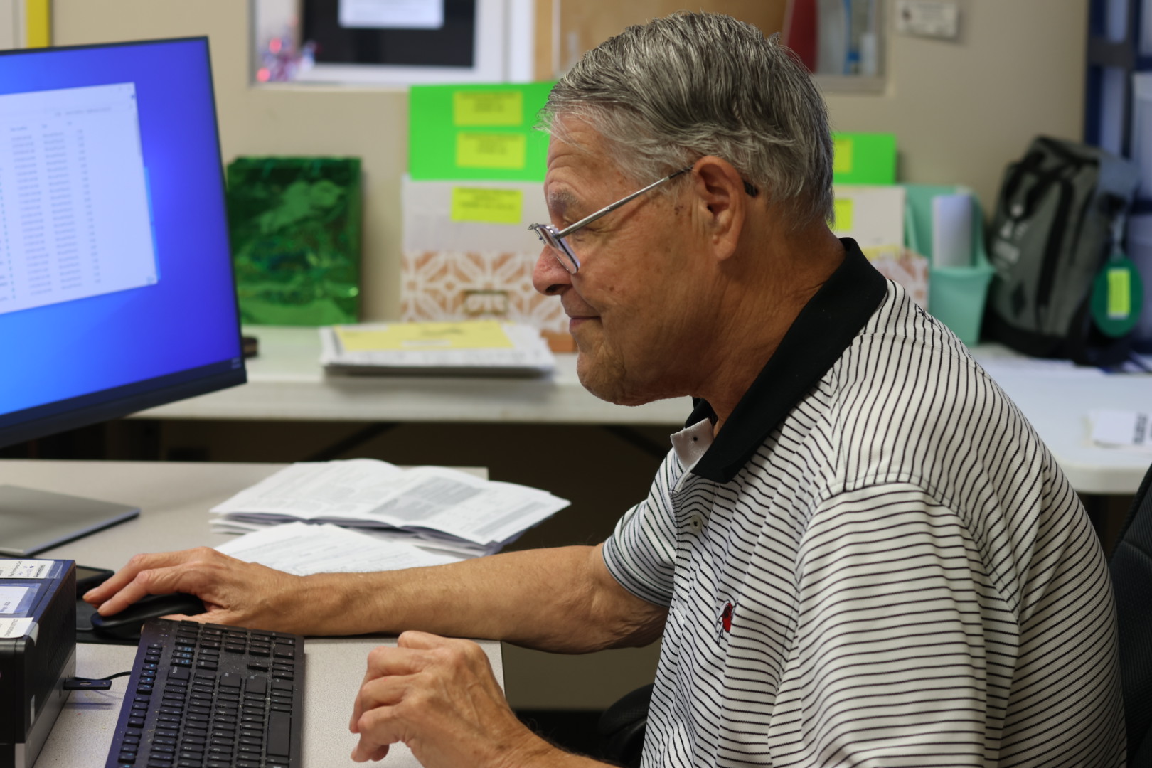 Oglethorpe County Board of Elections assistant Steve McCannon urges voters to mail their absentee ballots as soon as possible. Georgia was last in the nation in July for on-time delivery with only 63.7% of first-class mail delivered on time. (Photo/ Sarah Coyne)