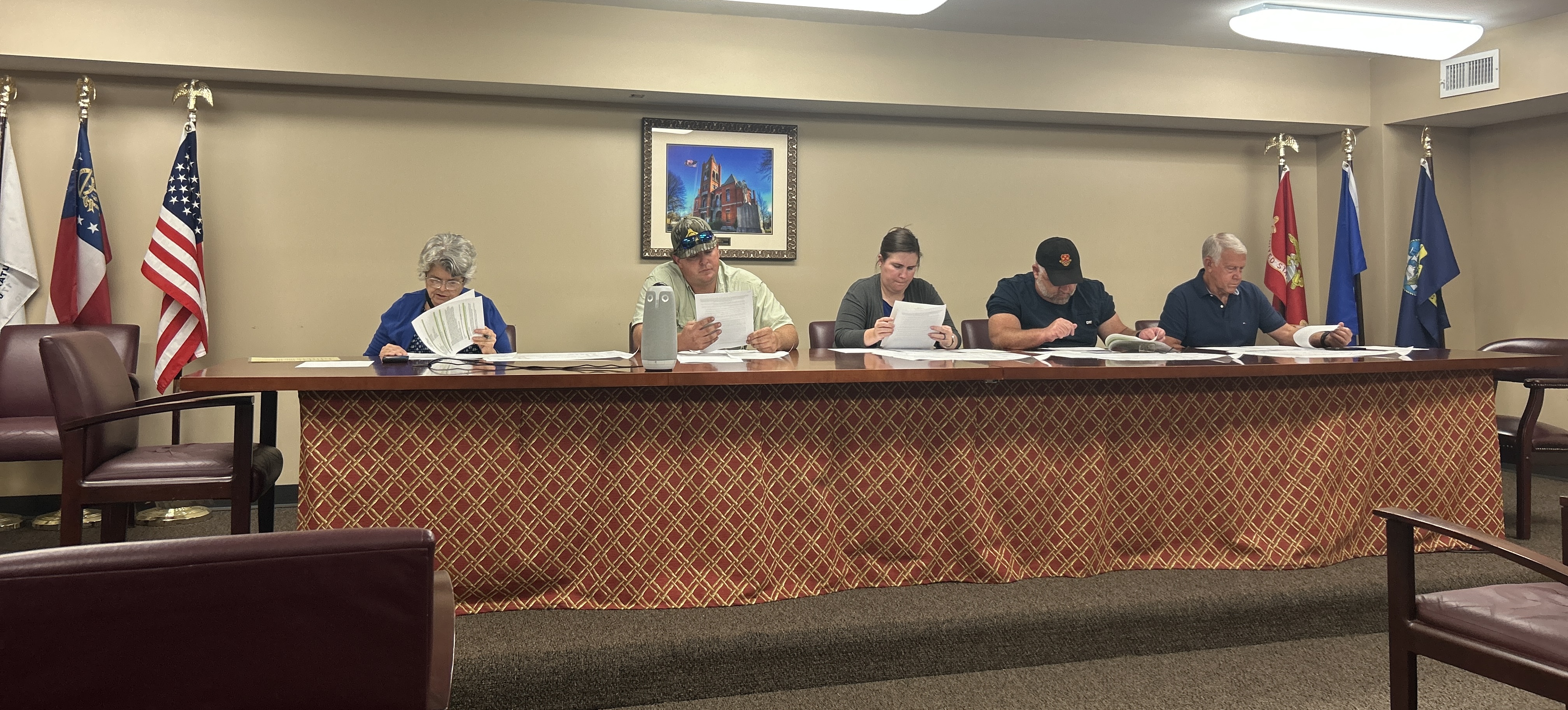 Oglethorpe County zoning board members Janet Hill (from left), JF Hansford, Morgan Robinson, Robert Drew and Jimmy Shealy call the September zoning board meeting to order. The board discussed a request to subdivide land on Morgan Road in Comer. (Chloe Beaver/The Oglethorpe Echo)