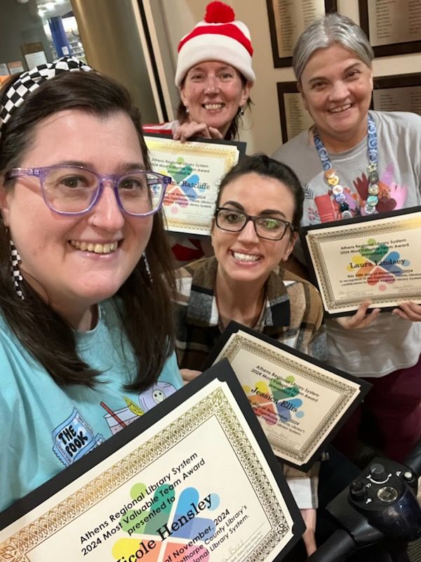The Oglethorpe County Library staff includes (from left): Nicole Hensley, Katherine Ratcliffe, Jessica Ellis and Laura Lindsey. They recently received the Athens Regional Library System 2024 Most Valuable Team Award. (Submitted Photo)