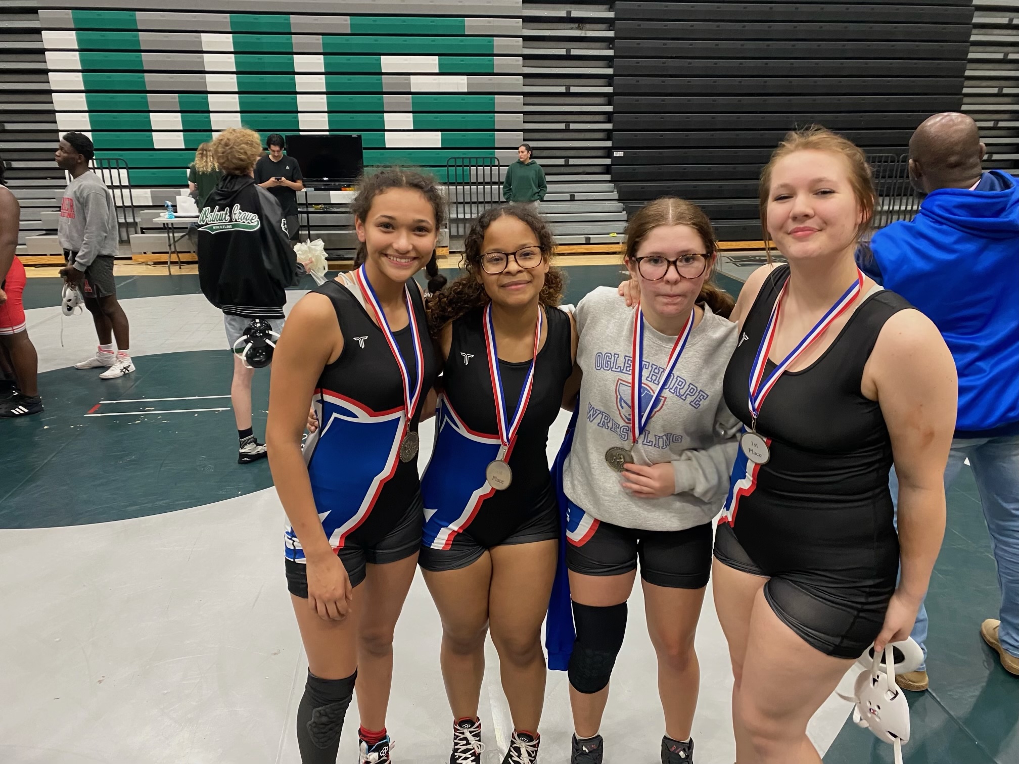 OCHS wrestlers Akira Owens, Nyah McAphee, Emily Gregory and Tori Miller each went 2-0 in their matches on Friday. “Overall, it was a good night,” OCHS coach Steve Mason said. (Submitted Photo)