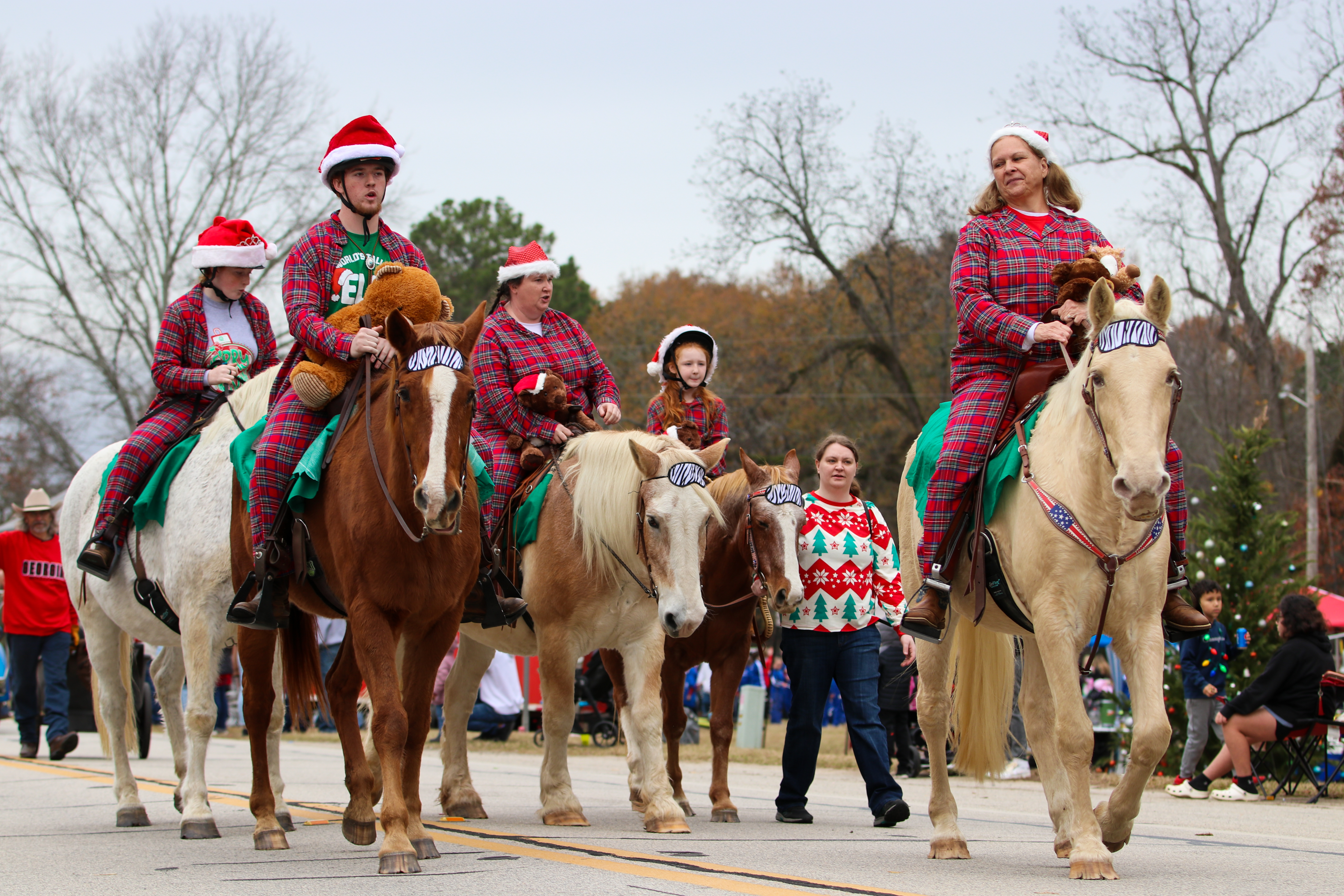 The Echo Hill riders trot out in front of Santa’s float in the 4th annual Maxeys Christmas parade, Saturday, Dec. 3, 2022. They took home the first place award for their costumes, and their horses matching ones. (Submitted Photo/Aisha Schulz)
