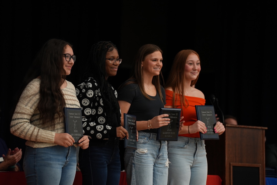 OCHS cheer team award winners (from left to right): Alexa Lopez-Quijada (Most Improved), Qi’ Dasha Fleming (Spirit Award), Mackensie Brown (All-American) and Sara Myers (Patriot Award). (Saylor Williams/The Oglethorpe Echo)