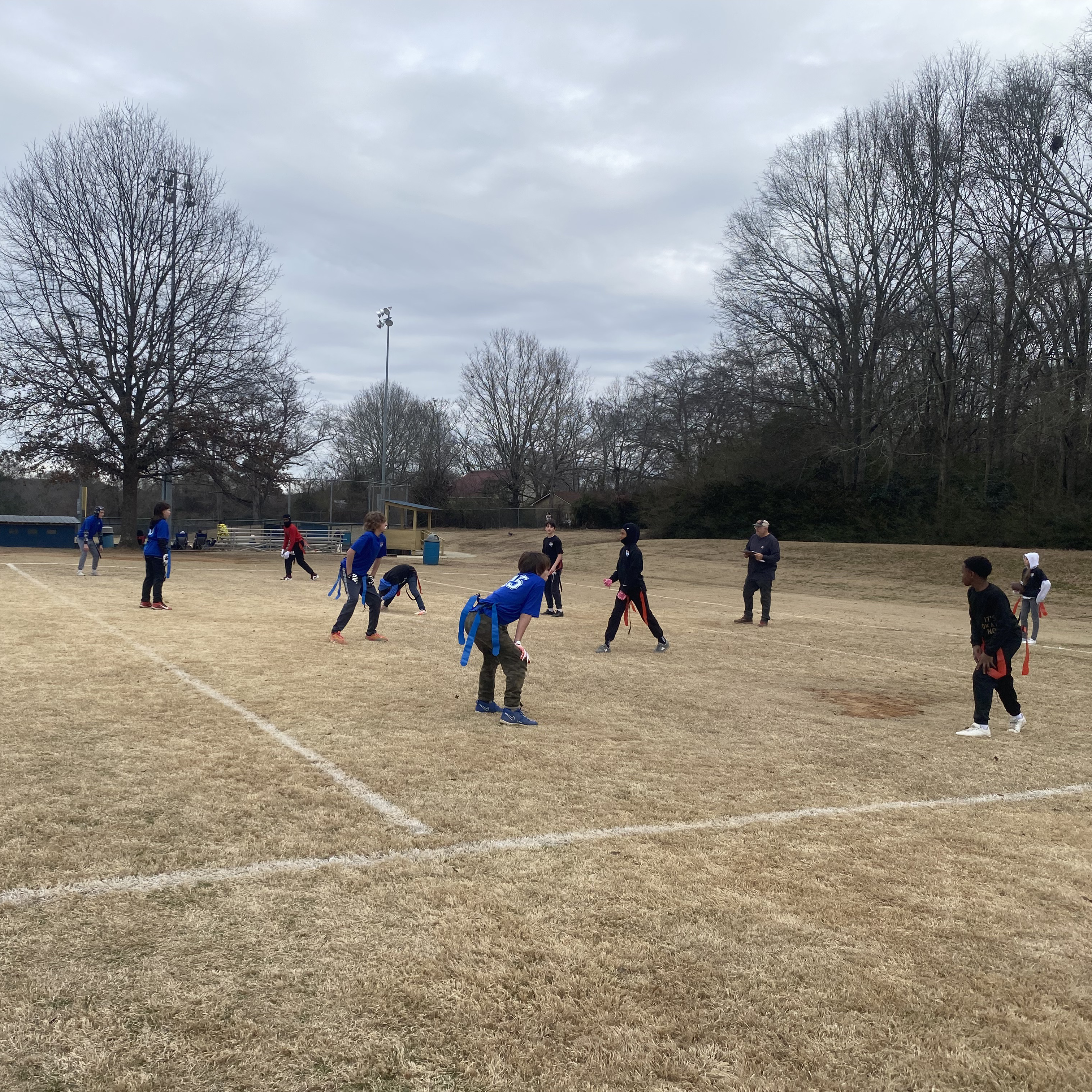 The 12u flag football teams coached by Daniel Rotberg and Eric Pittard face off for the league title. Rotberg’s team won the championship with a 28-20 victory. (Photo/Anna Izquierdo)