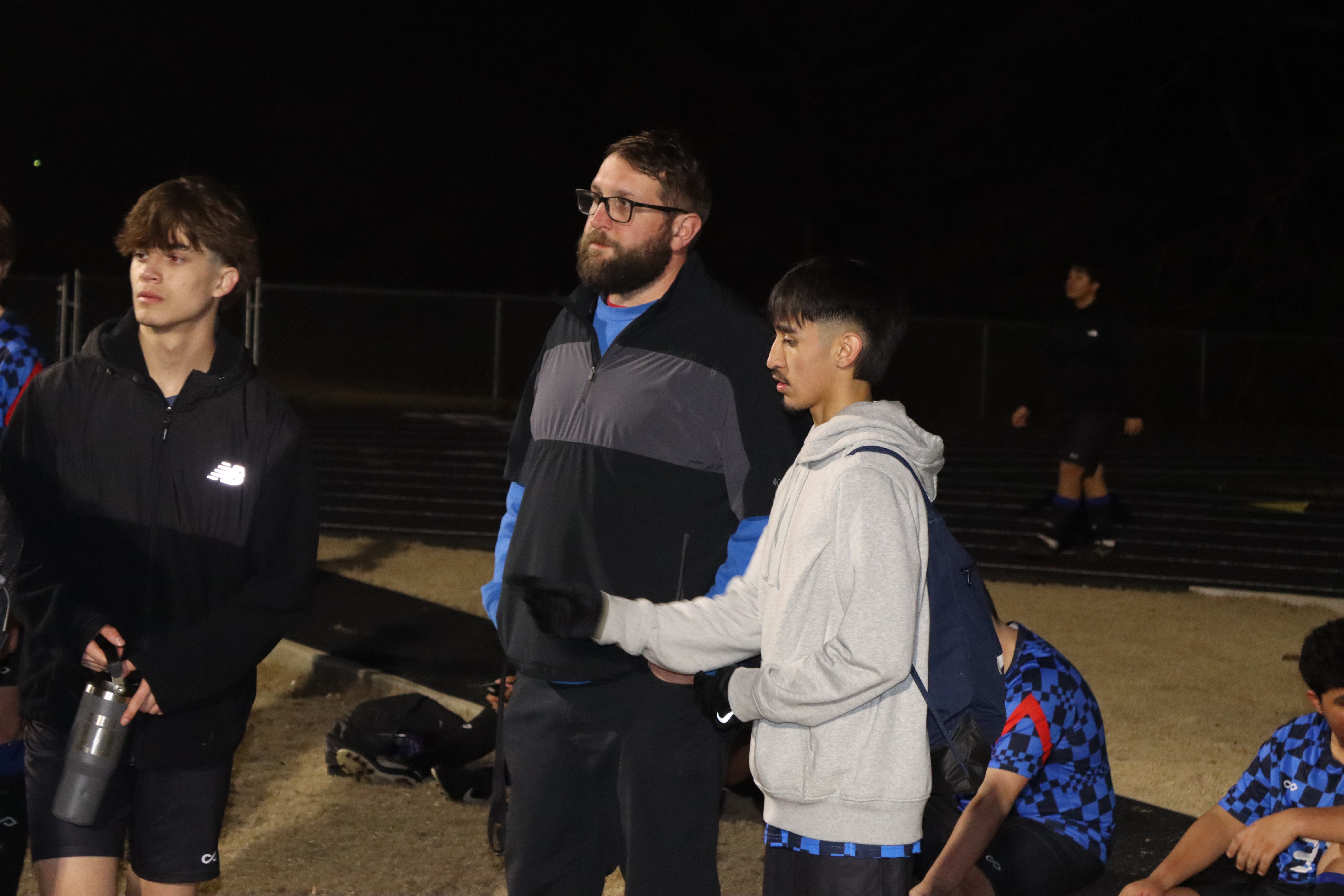 OCHS boys soccer coach Josh Austin talks to his players before the Patriots’ opener against Monroe Area on Feb. 18. Austin is in his first season as head coach. (Photo/ Kayda Hammock)