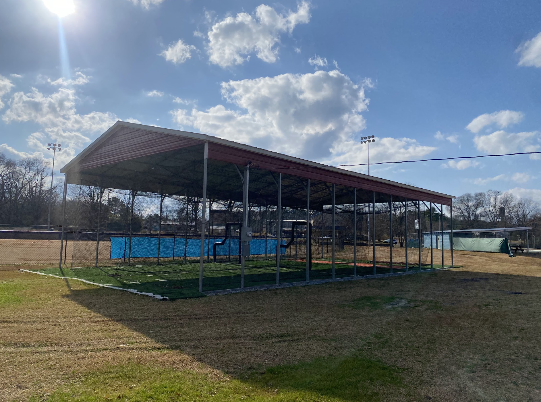 Bryan Park's new two-sided batting cage features new netting, turf  floors and LED lights. The cage is 1,800 square feet and cost $20,000. (Mitchell Stone/The Oglethorpe Echo)