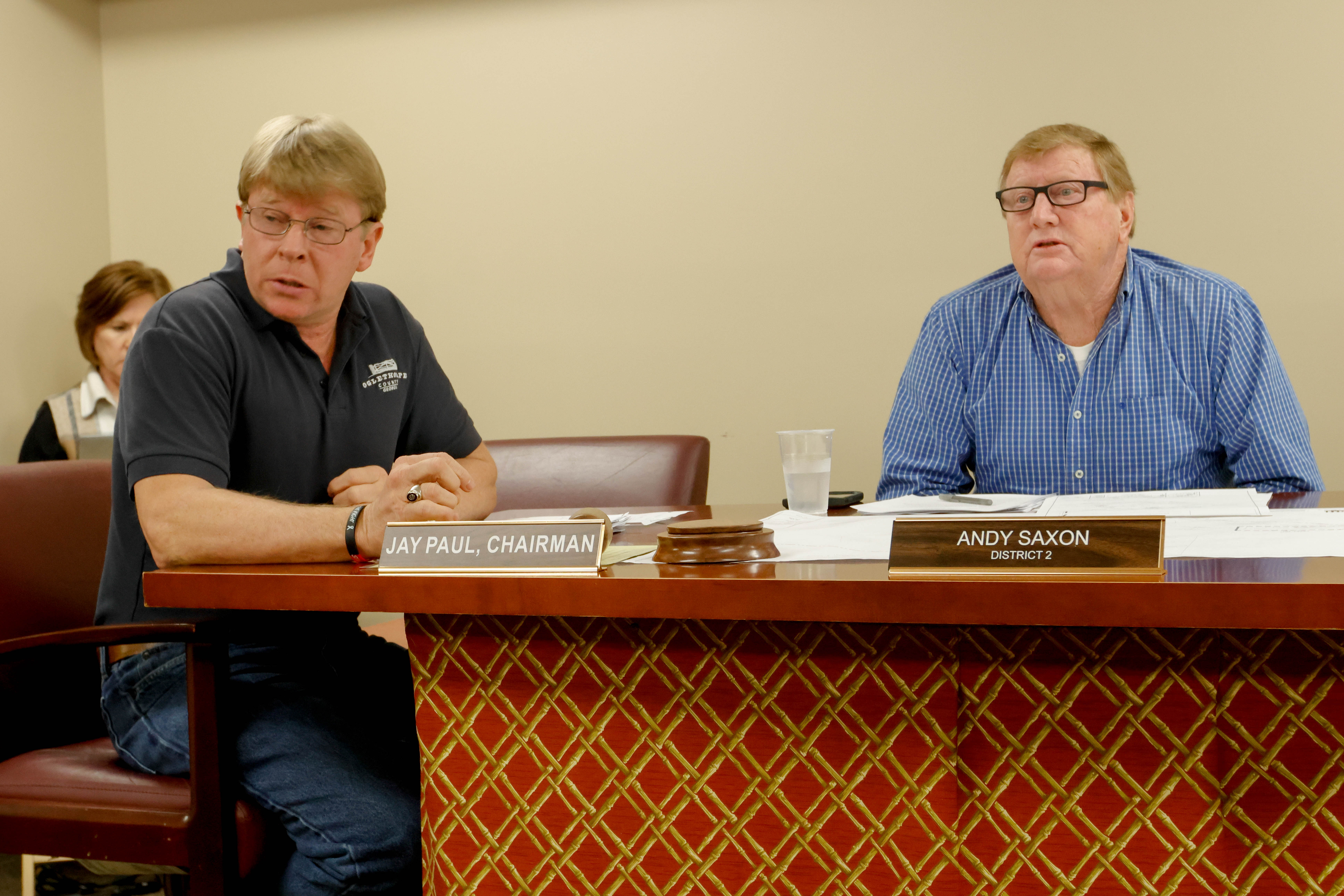 Oglethorpe County Commission Chairman Jay Paul and District 2 Commissioner Andy Saxon speak during the Board of Commissioners meeting within the Tax Commissioner’s Office in Oglethorpe County on Monday, Feb. 3, 2025. Topics discussed during the aforementioned meeting included discourse about the Timberland Solar Project, a request to rezone a home in Winterville, and the approval of bike ride on the Firefly trail in late March. (Photo/Felix Scheyer)