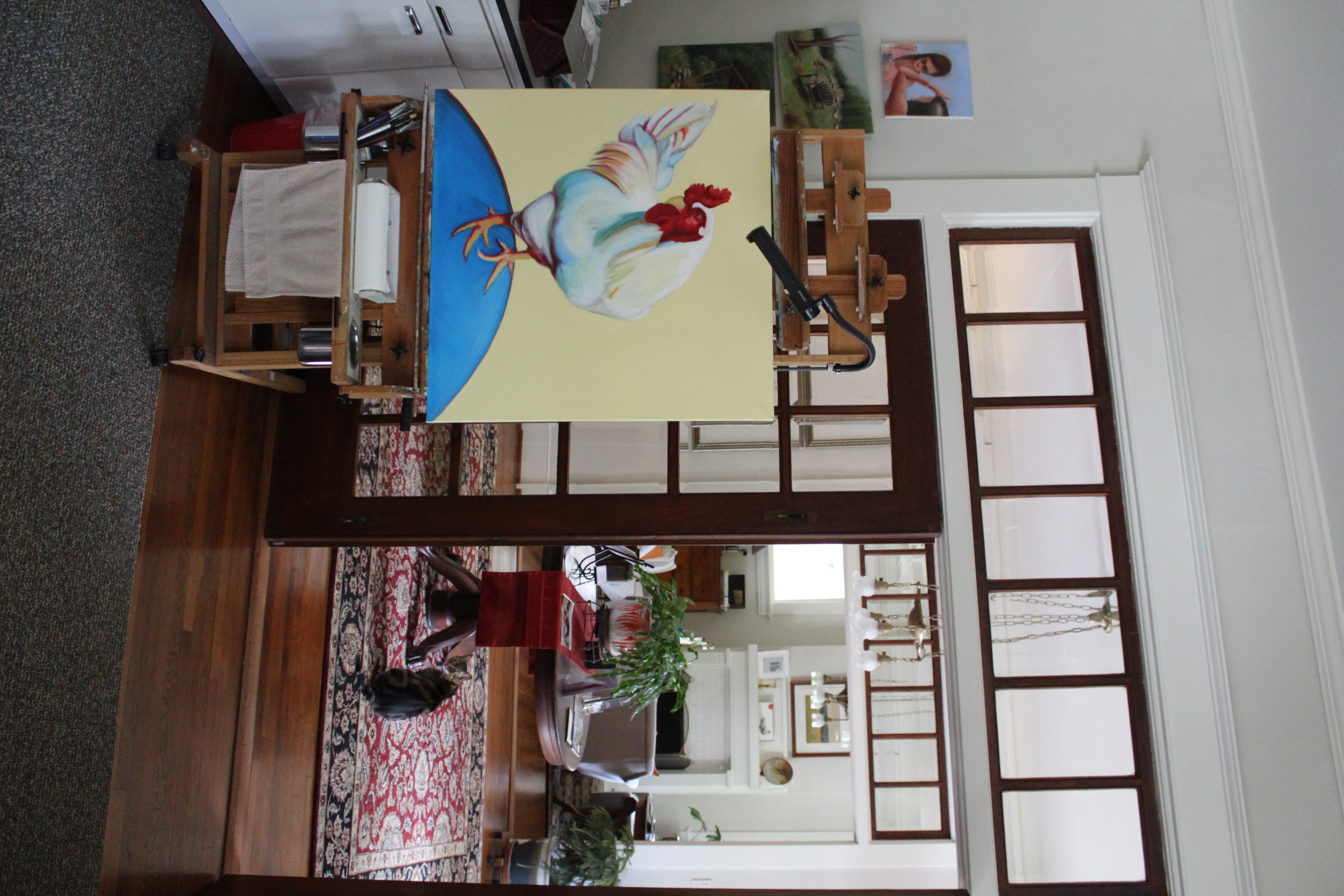 Cynzia Sanchez’s unfinished painting sits in her office at the Gillen House Bed and Breakfast on Monday, March 24. Her portraits hang throughout the Gillen House and have been showcased at Rowdy Rooster. “I have not painted hardly any in the last few years,” Sanchez said. “I've done portraits. Most of the commission work I do is portraits. But new work, no.” (Photo/Emily Slepsky)